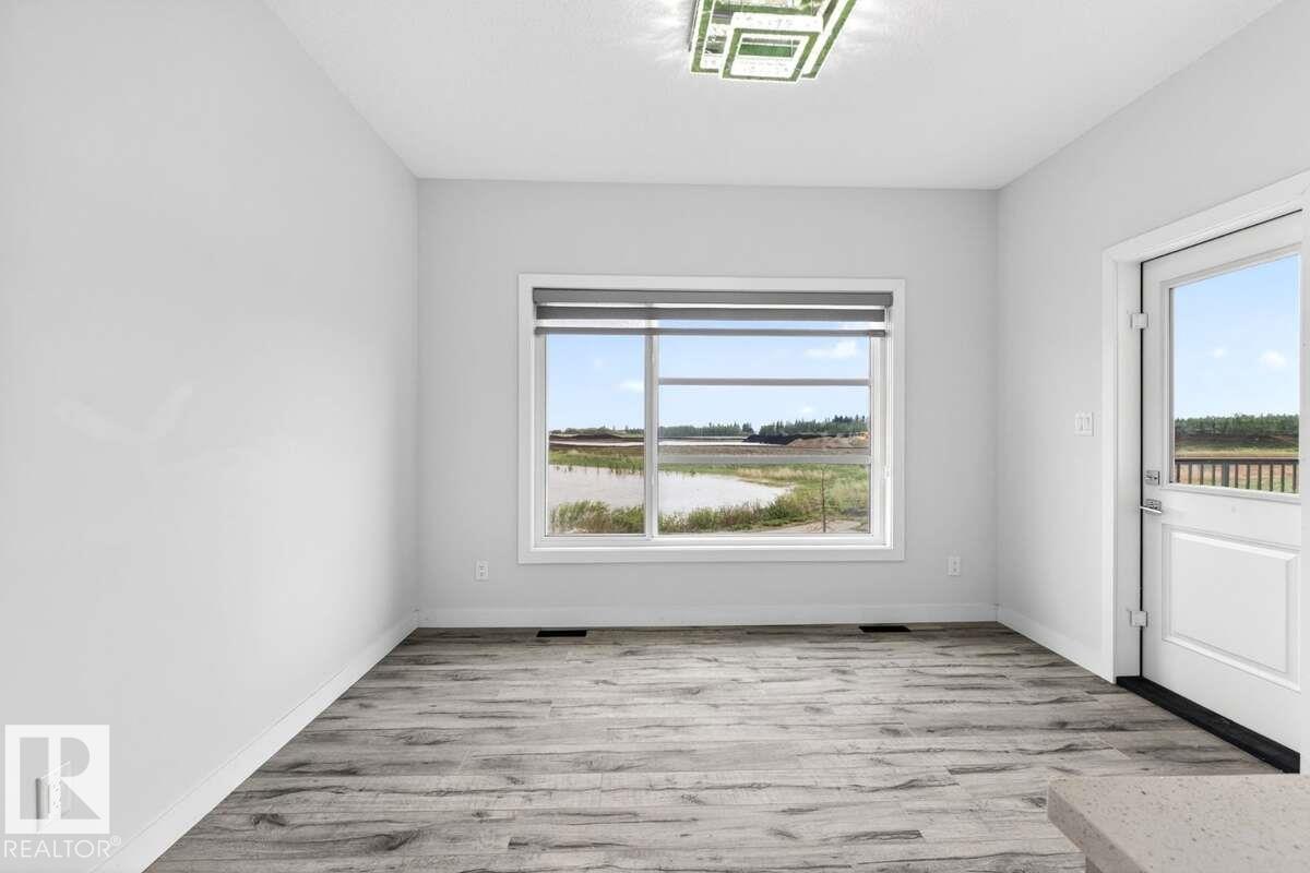 Photo 16 at 577 Boulder Wynd, Black Stone, Leduc