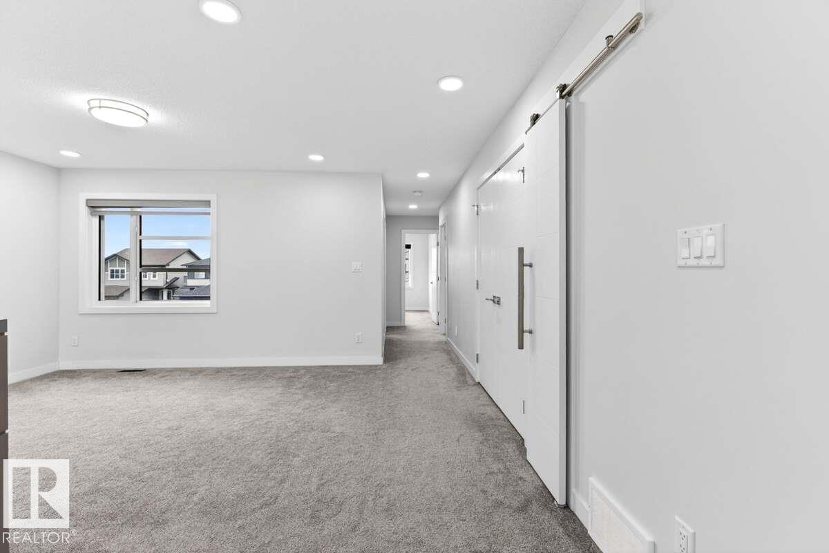 Photo 32 at 577 Boulder Wynd, Black Stone, Leduc