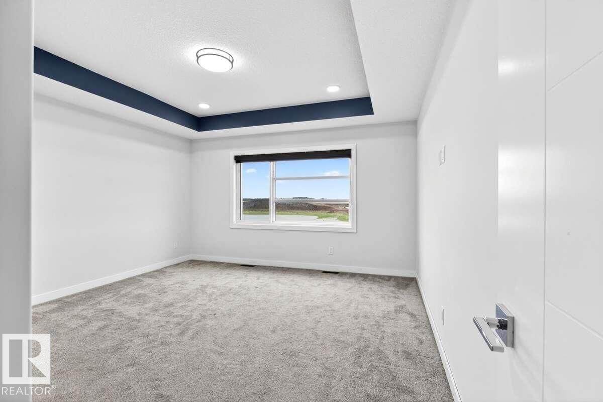 Photo 34 at 577 Boulder Wynd, Black Stone, Leduc