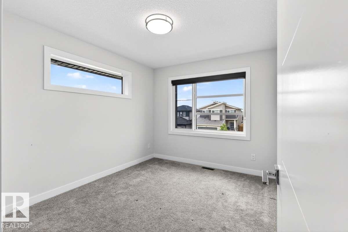 Photo 42 at 577 Boulder Wynd, Black Stone, Leduc