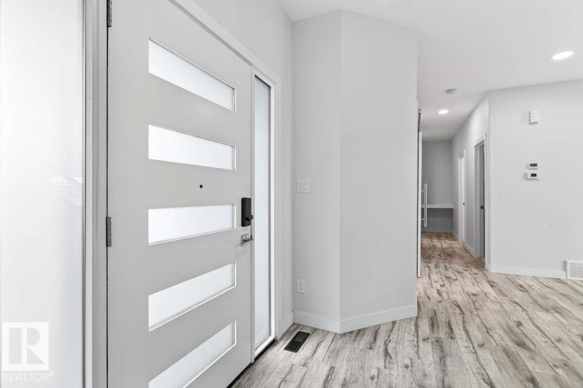Photo 7 at 577 Boulder Wynd, Black Stone, Leduc