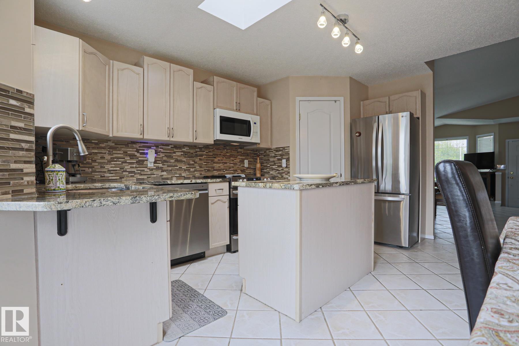 Photo 17 at 7716 154 Avenue NW, Mayliewan, Edmonton
