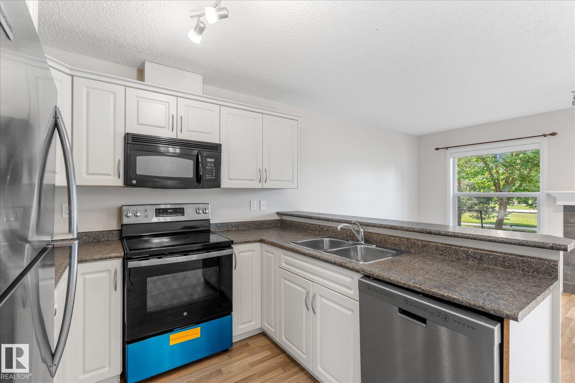 Photo 9 at 67 - 15 Woodsmere, Westpark, Fort Saskatchewan