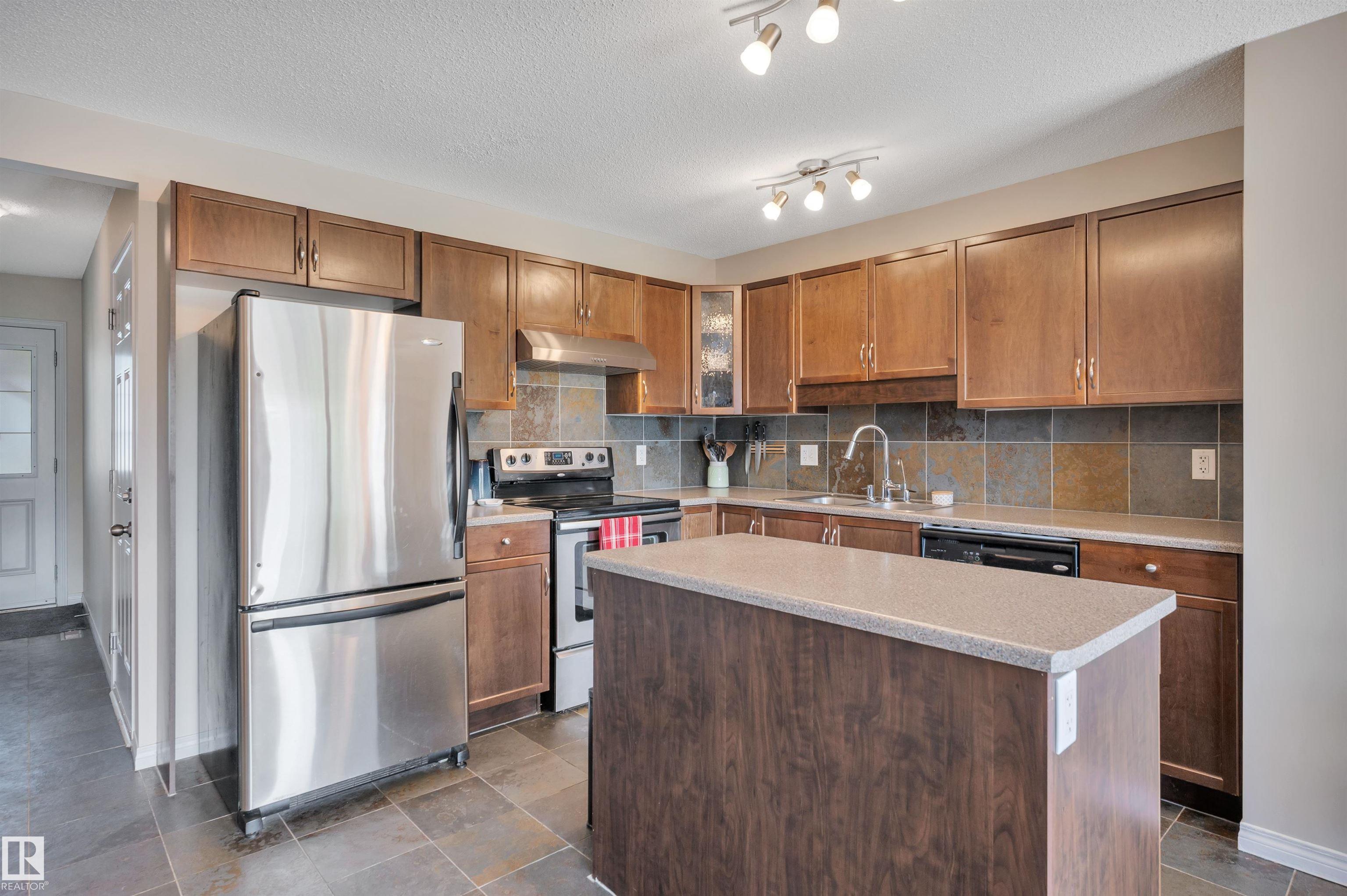 Photo 9 at 5819 8 Avenue SW, Charlesworth, Edmonton