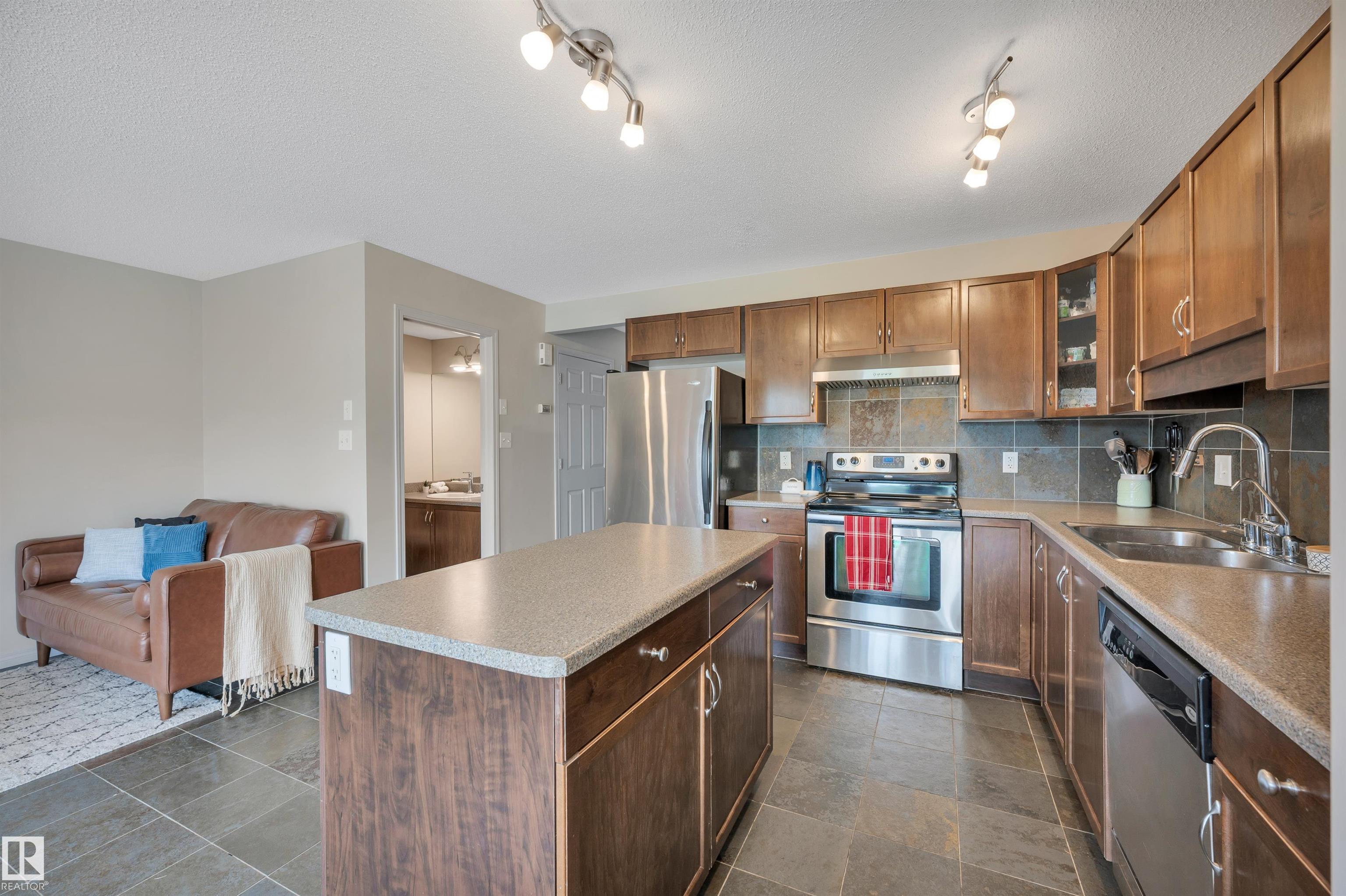 Photo 10 at 5819 8 Avenue SW, Charlesworth, Edmonton