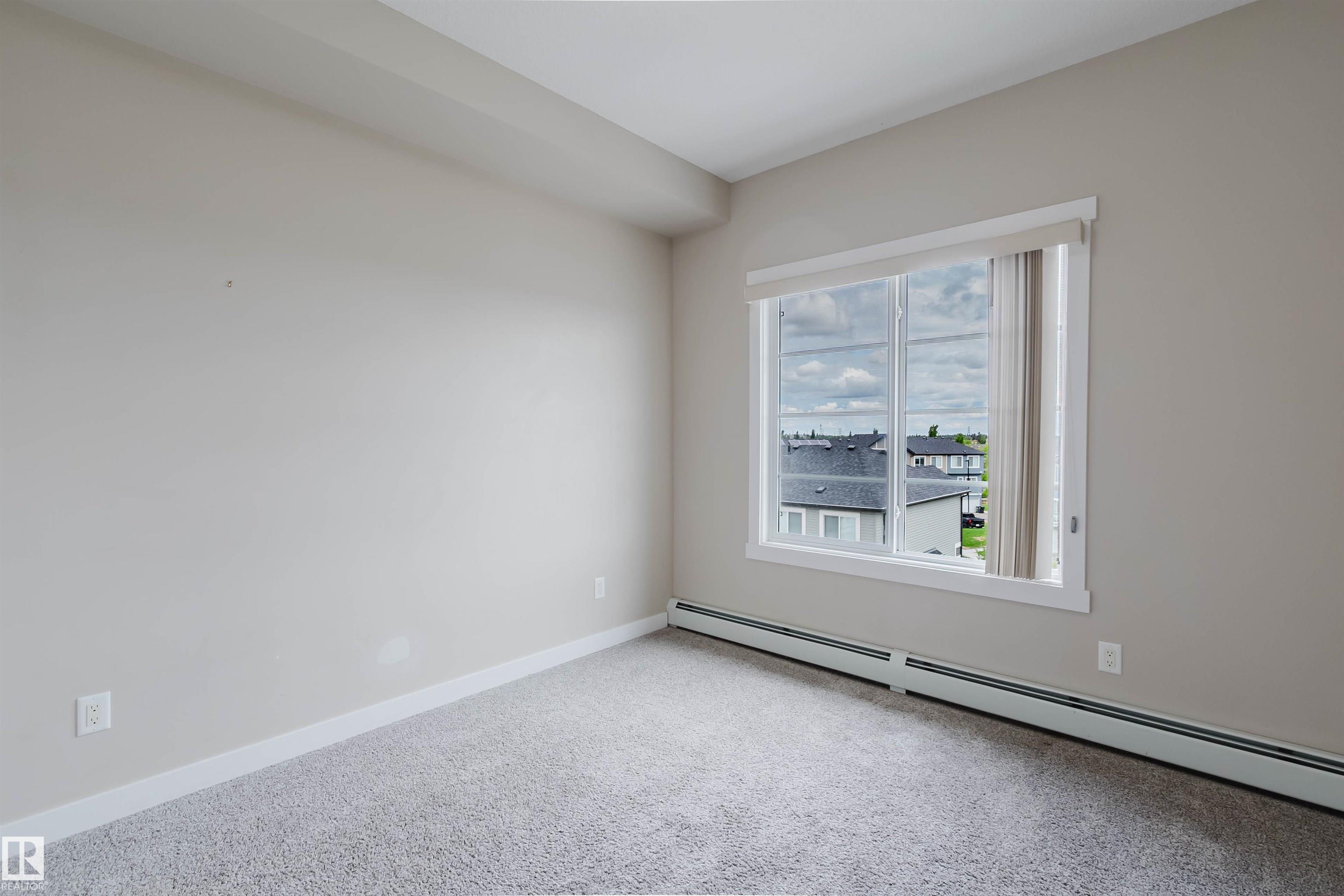 Photo 21 at 402 - 3670 139 Avenue NW, Clareview Town Centre, Edmonton
