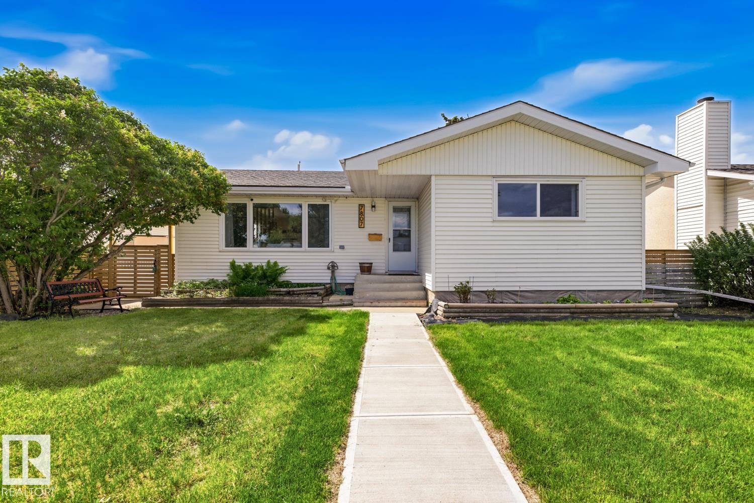 Welcome to this well-maintained bungalow in family-friendly Balwin! The bright open-concept main floor features a modern white kitchen with a large island, updated flooring, and a spacious living and dining area perfect for everyday living and entertaining. Comfortable bedrooms and a full bath complete the main level. The basement offers added flexibility with a separate entrance, second kitchen, additional living space, bedrooms, and a full bathroom - ideal for extended family or multi-generational living. Situated on a mature lot with durable vinyl siding, the fully fenced backyard features a patio with pergola for outdoor enjoyment. The oversized detached double garage provides ample parking, storage, and workspace.  Conveniently located just minutes from Balwin School (K?9), Londonderry Mall, Costco, parks, and major routes including 82 Street, Yellowhead Trail, and Manning Drive. A move-in-ready opportunity offering great value for first-time buyers, downsizers, or investors!
