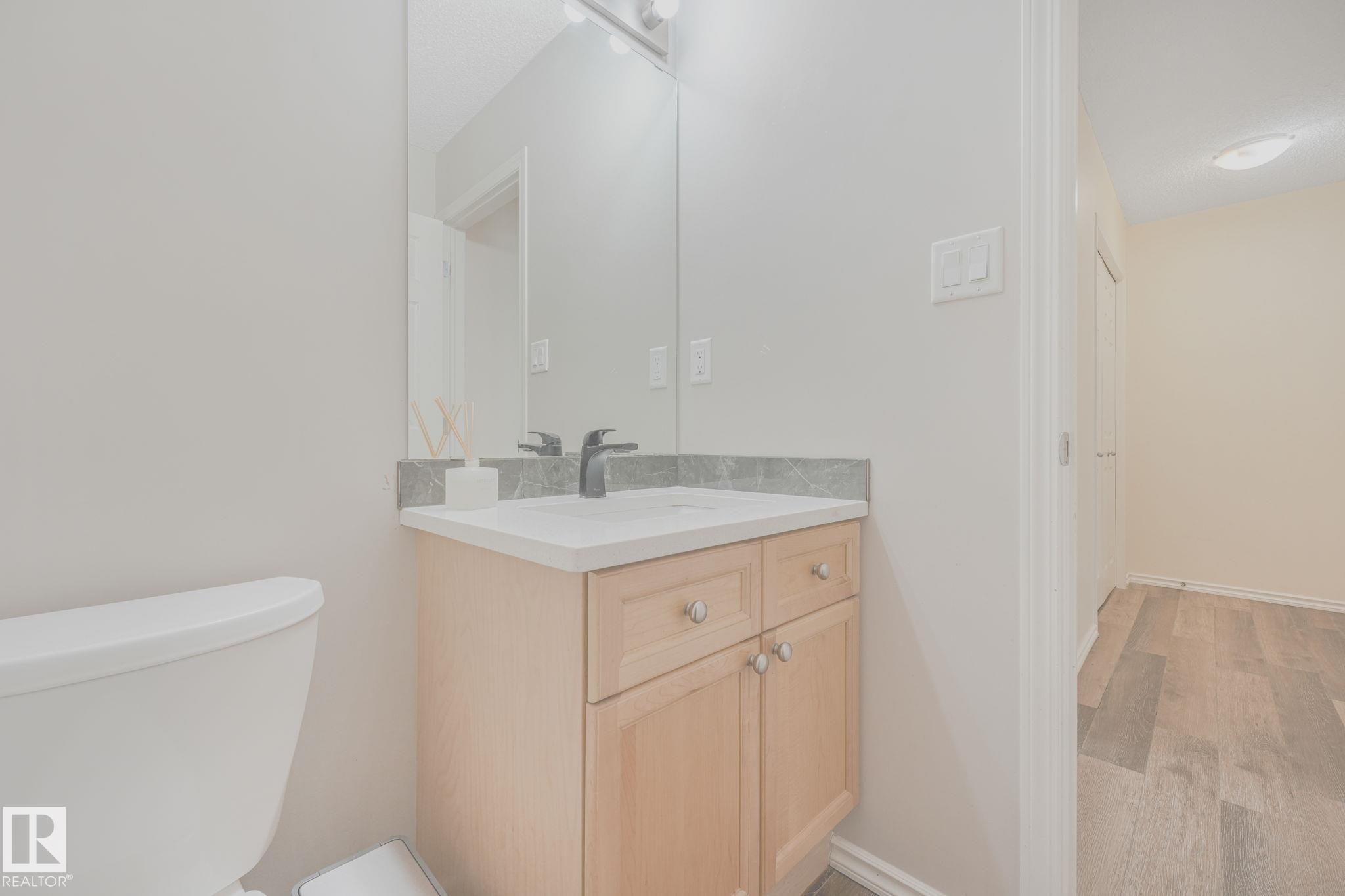 Photo 11 at 56 - 451 Hyndman Crescent NW, Canon Ridge, Edmonton