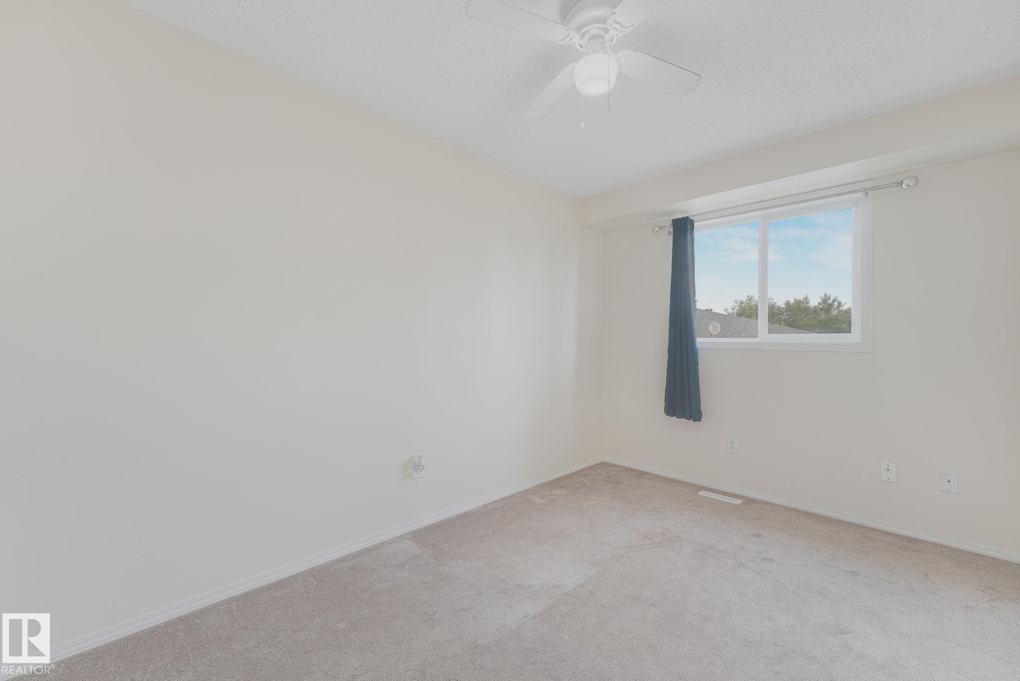 Photo 20 at 56 - 451 Hyndman Crescent NW, Canon Ridge, Edmonton