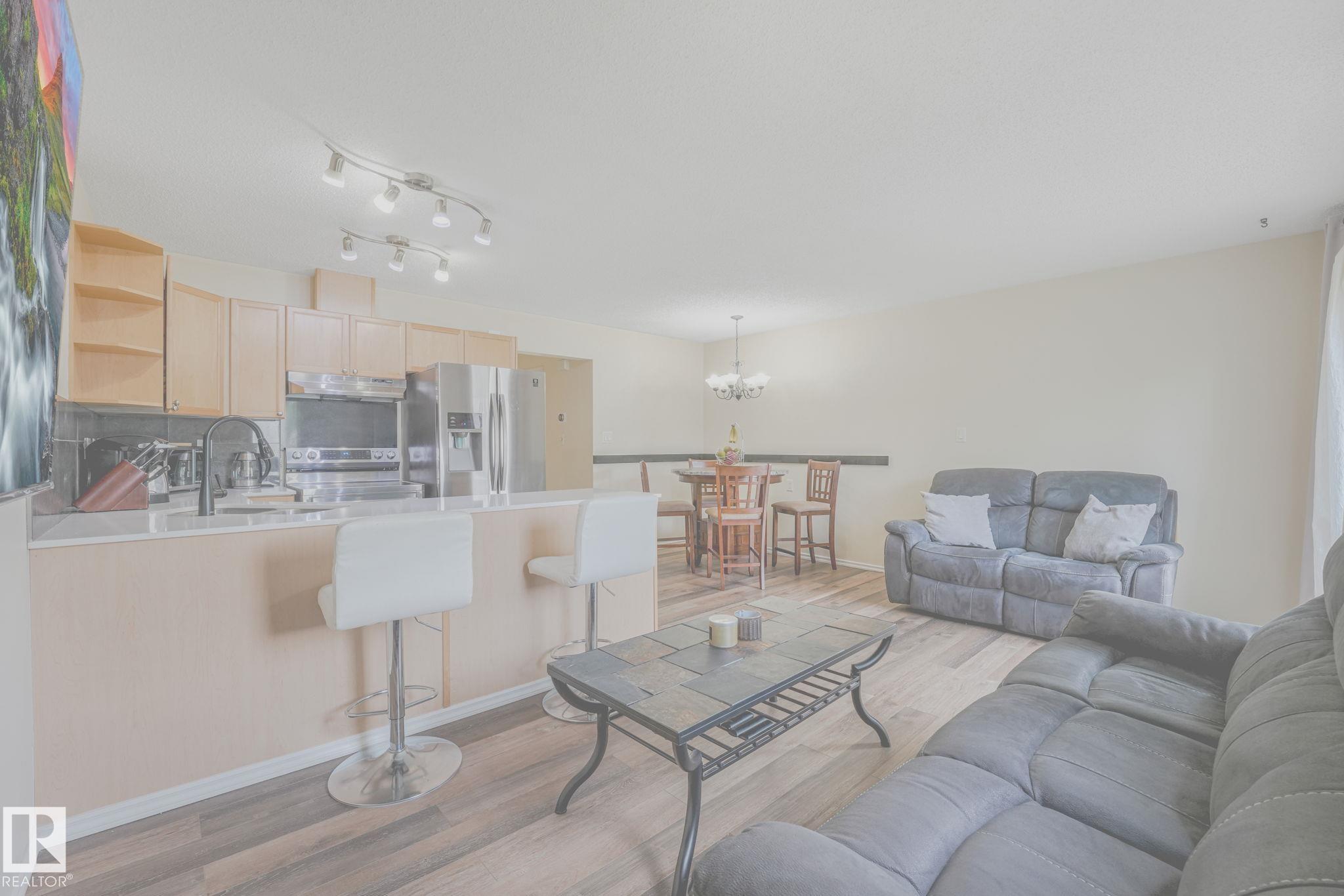 Photo 7 at 56 - 451 Hyndman Crescent NW, Canon Ridge, Edmonton
