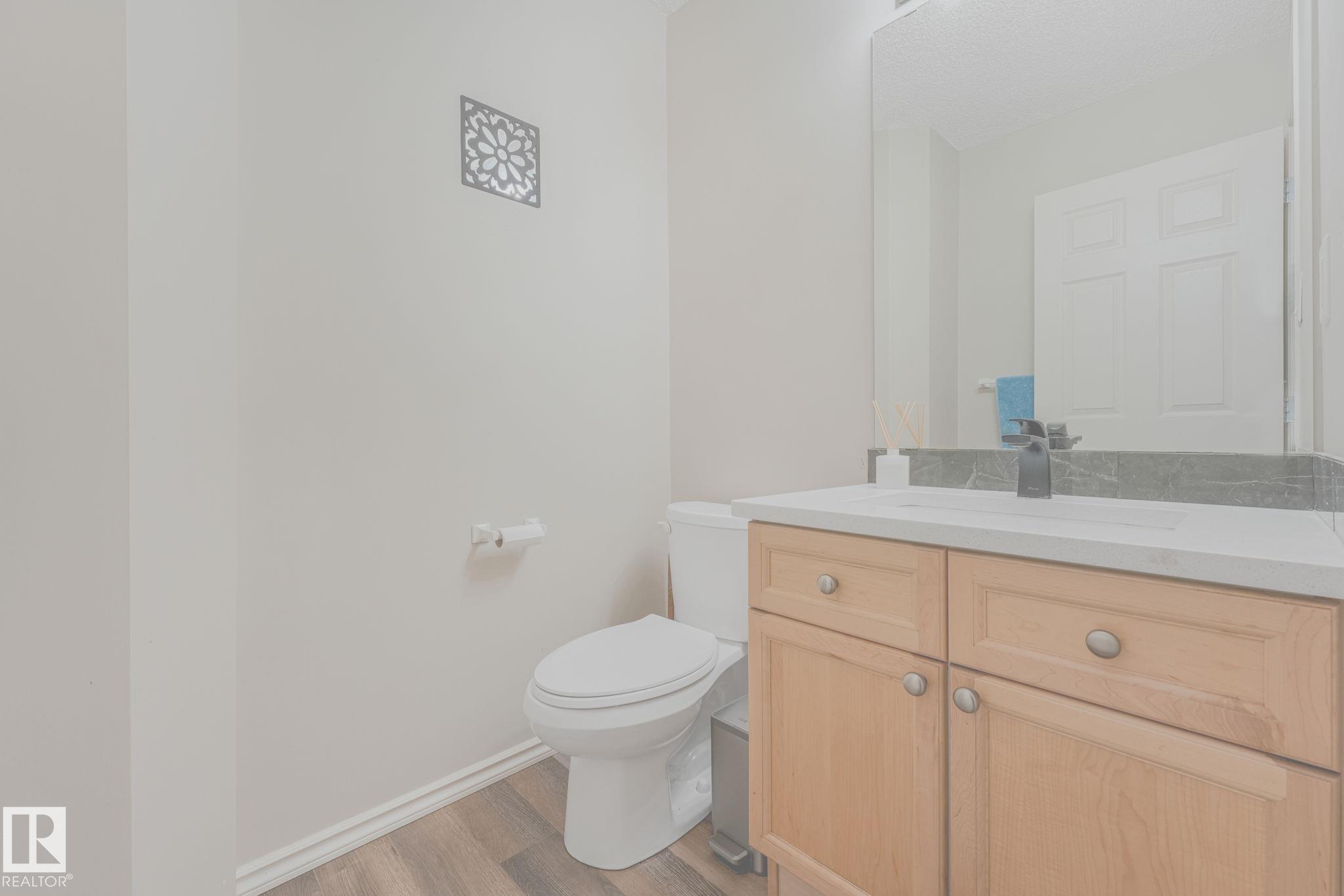 Photo 10 at 56 - 451 Hyndman Crescent NW, Canon Ridge, Edmonton