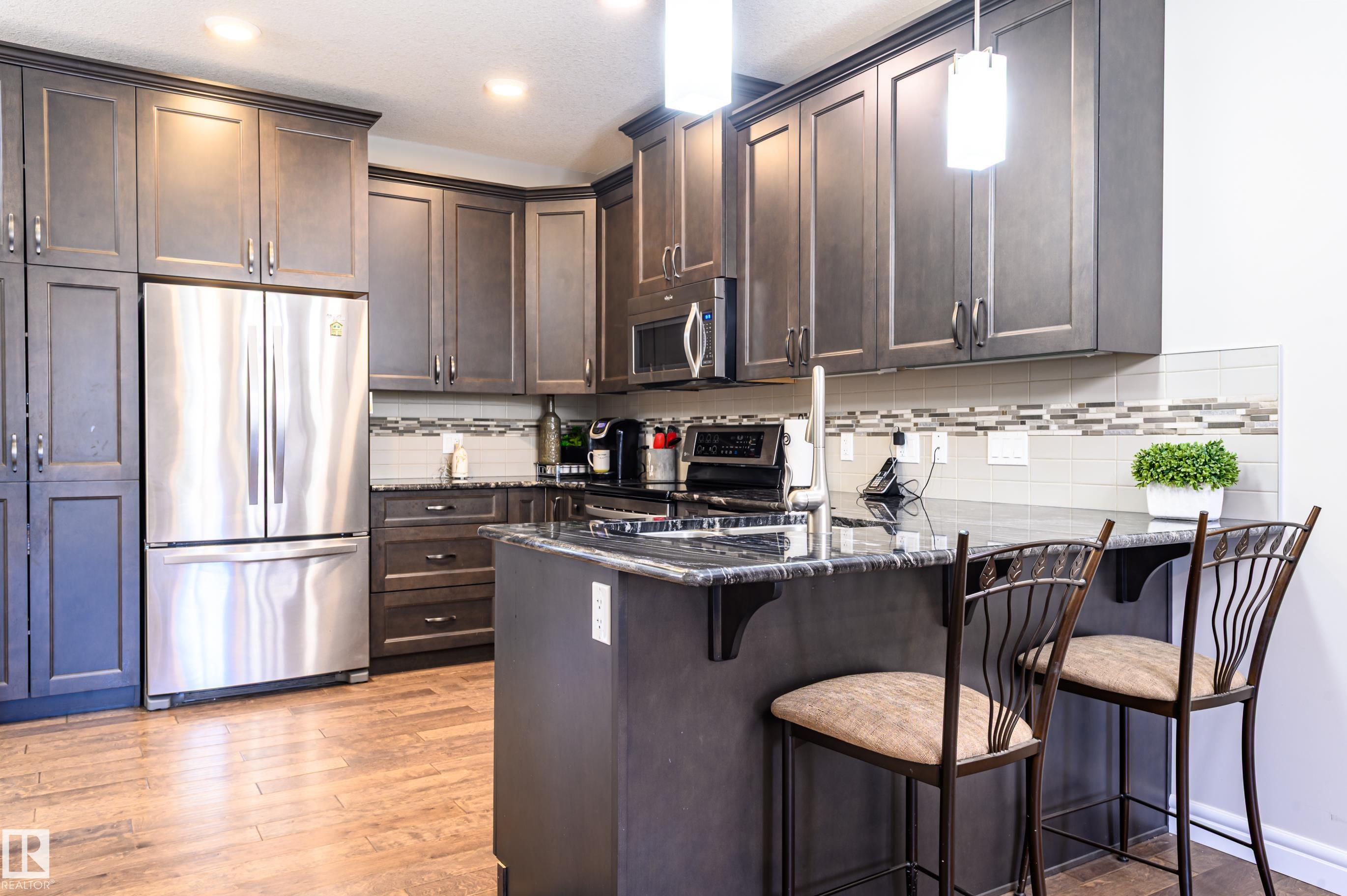 Photo 14 at 2 - 7115 Armour Link SW, Ambleside, Edmonton