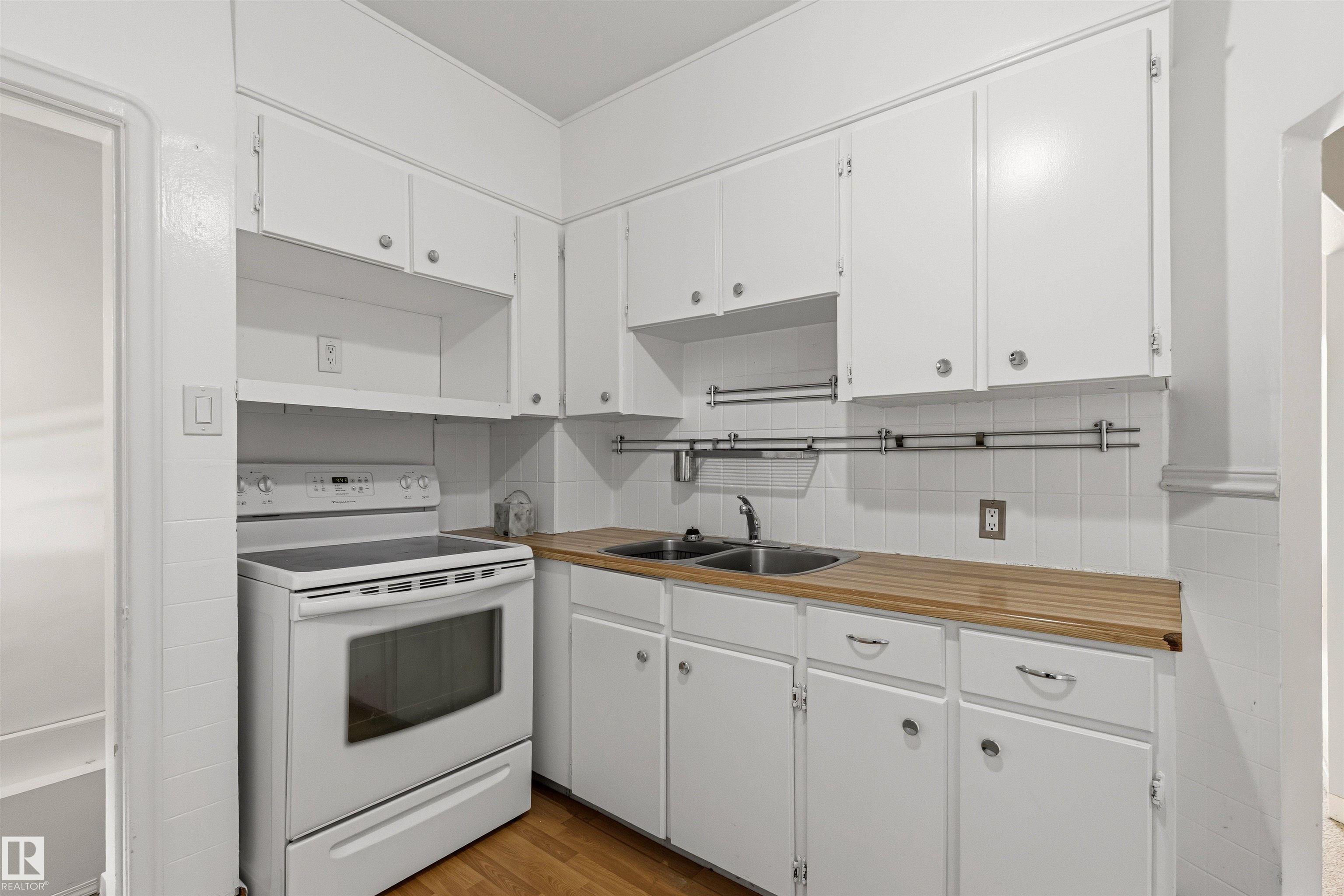 Photo 12 at 11417 65 Street NW, Highlands, Edmonton