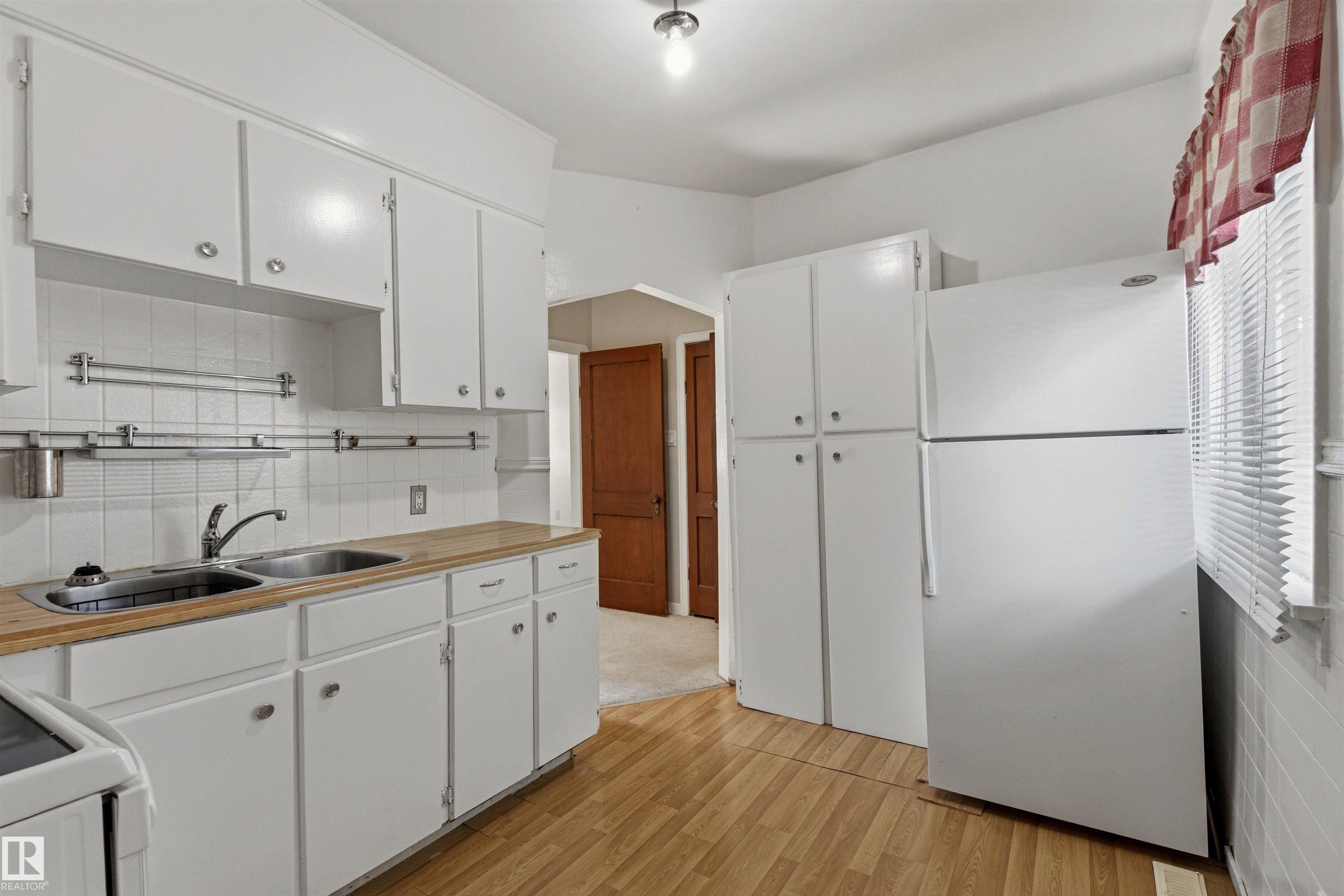 Photo 13 at 11417 65 Street NW, Highlands, Edmonton