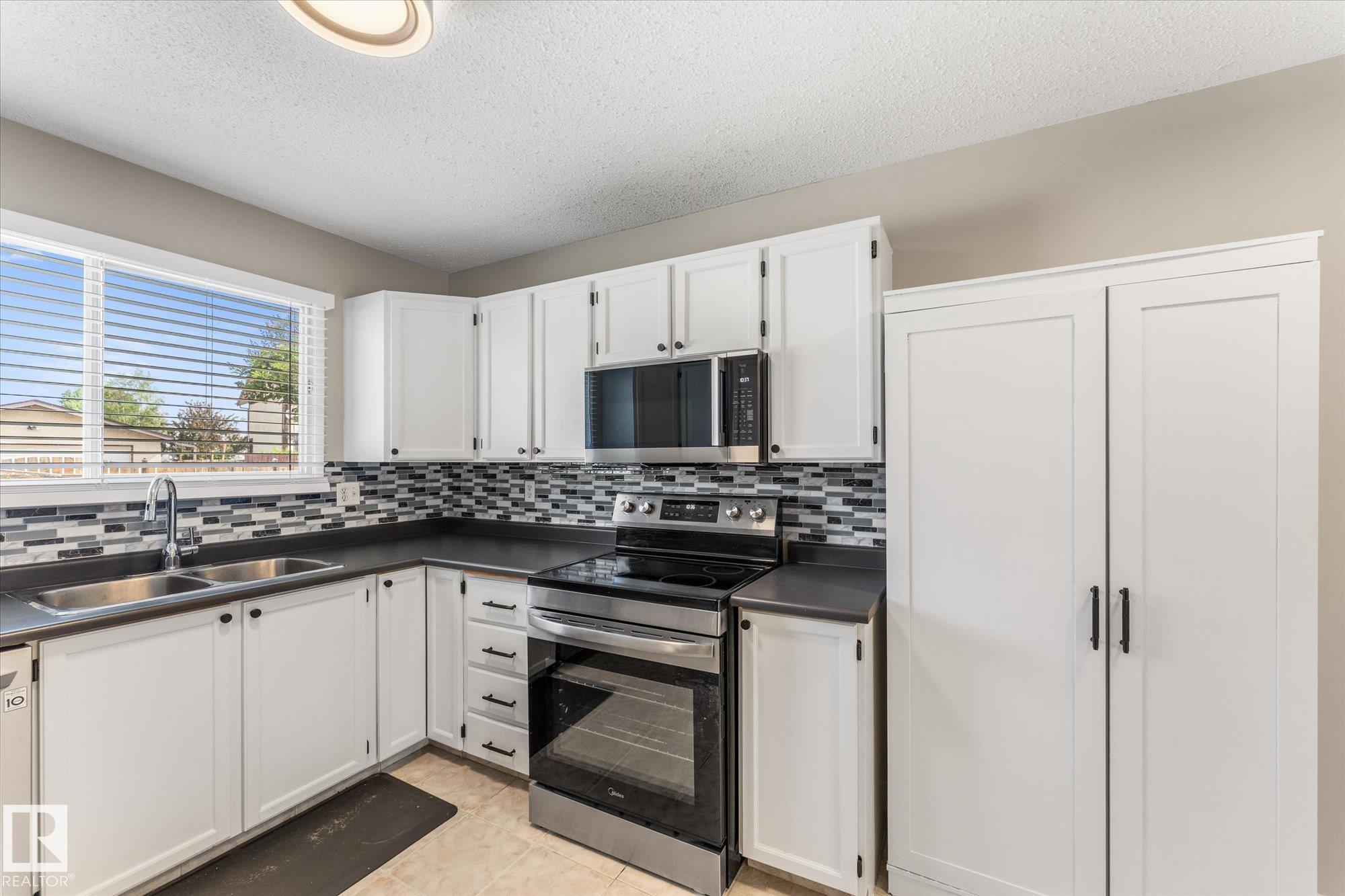 Photo 17 at 13840 30 Street NW, Hairsine, Edmonton