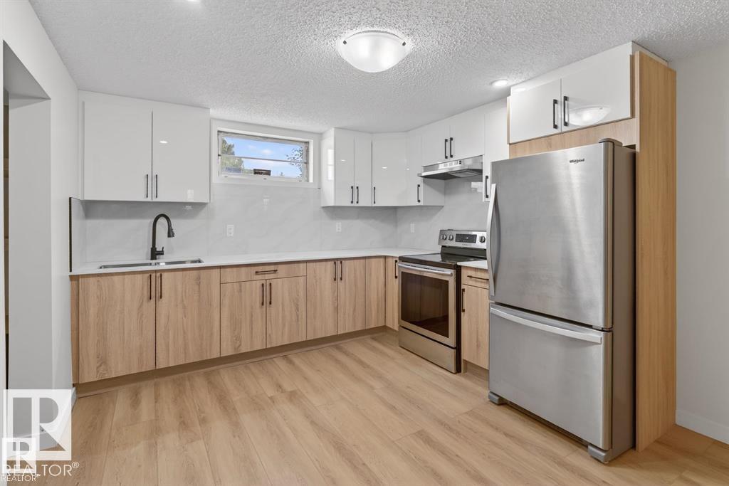 Photo 9 at 12936 132 Street NW, Athlone, Edmonton