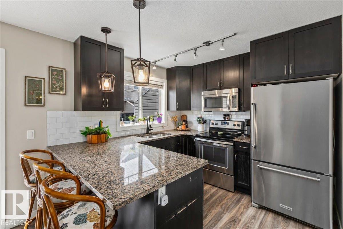 Photo 11 at 77 - 9535 217 Street NW, Secord, Edmonton