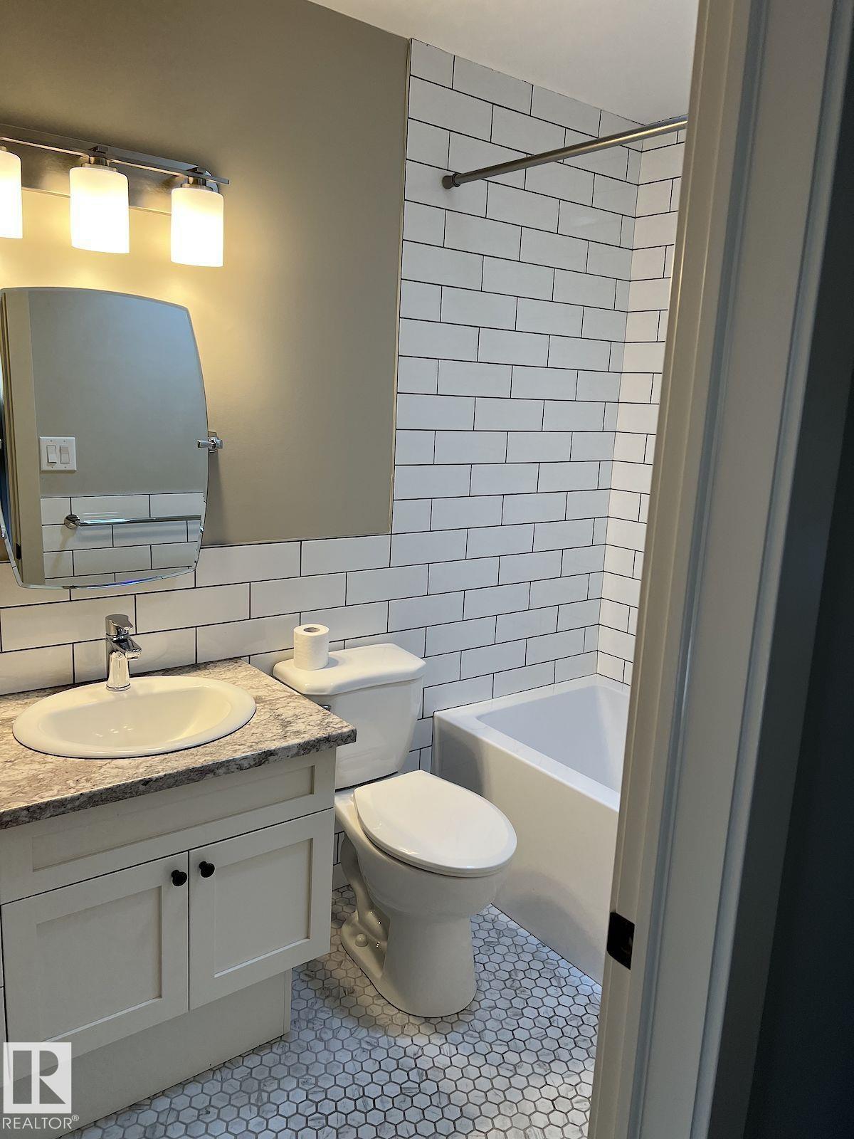 Photo 32 at 12929/31 103 Street NW, Lauderdale, Edmonton