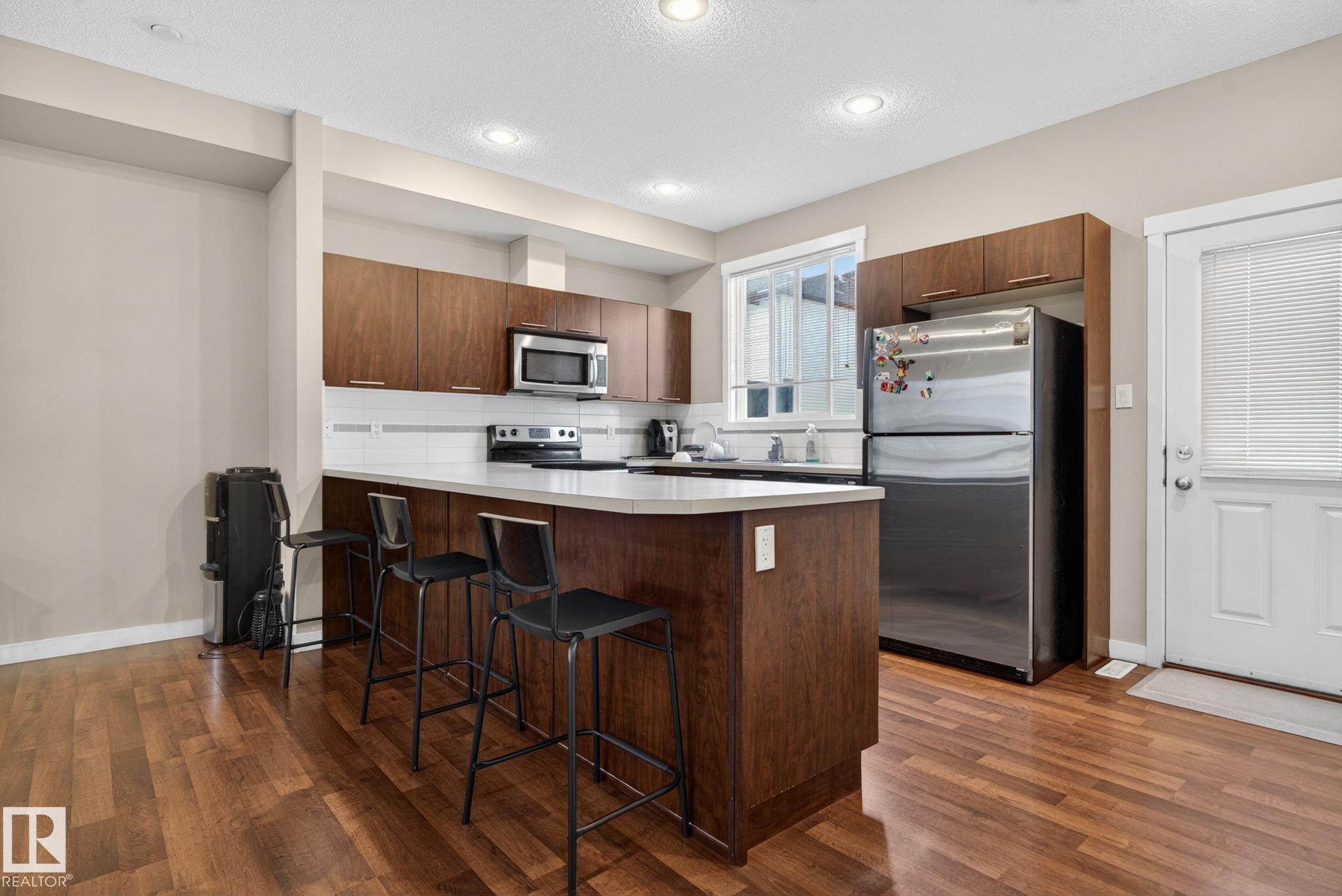 Photo 9 at 30 - 6075 Schonsee Way NW, Schonsee, Edmonton