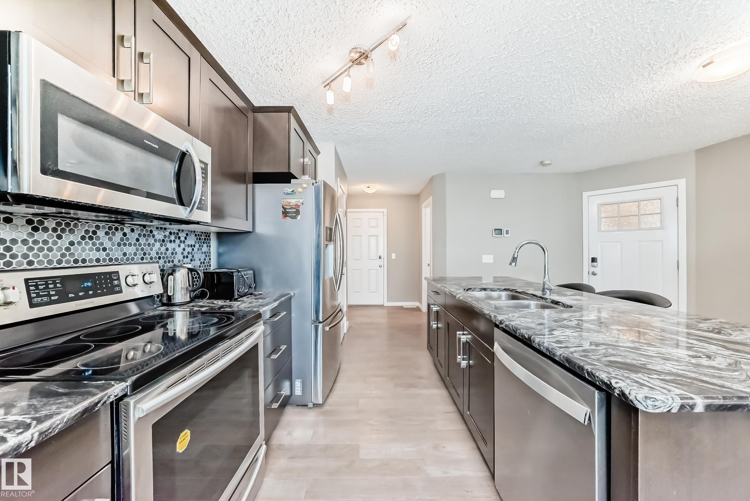 Photo 10 at 893 Ebbers Crescent NW, Ebbers, Edmonton