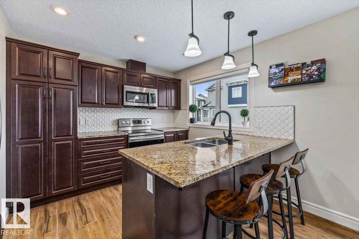 Photo 7 at 4 - 16335 84 Street NW, Belle Rive, Edmonton