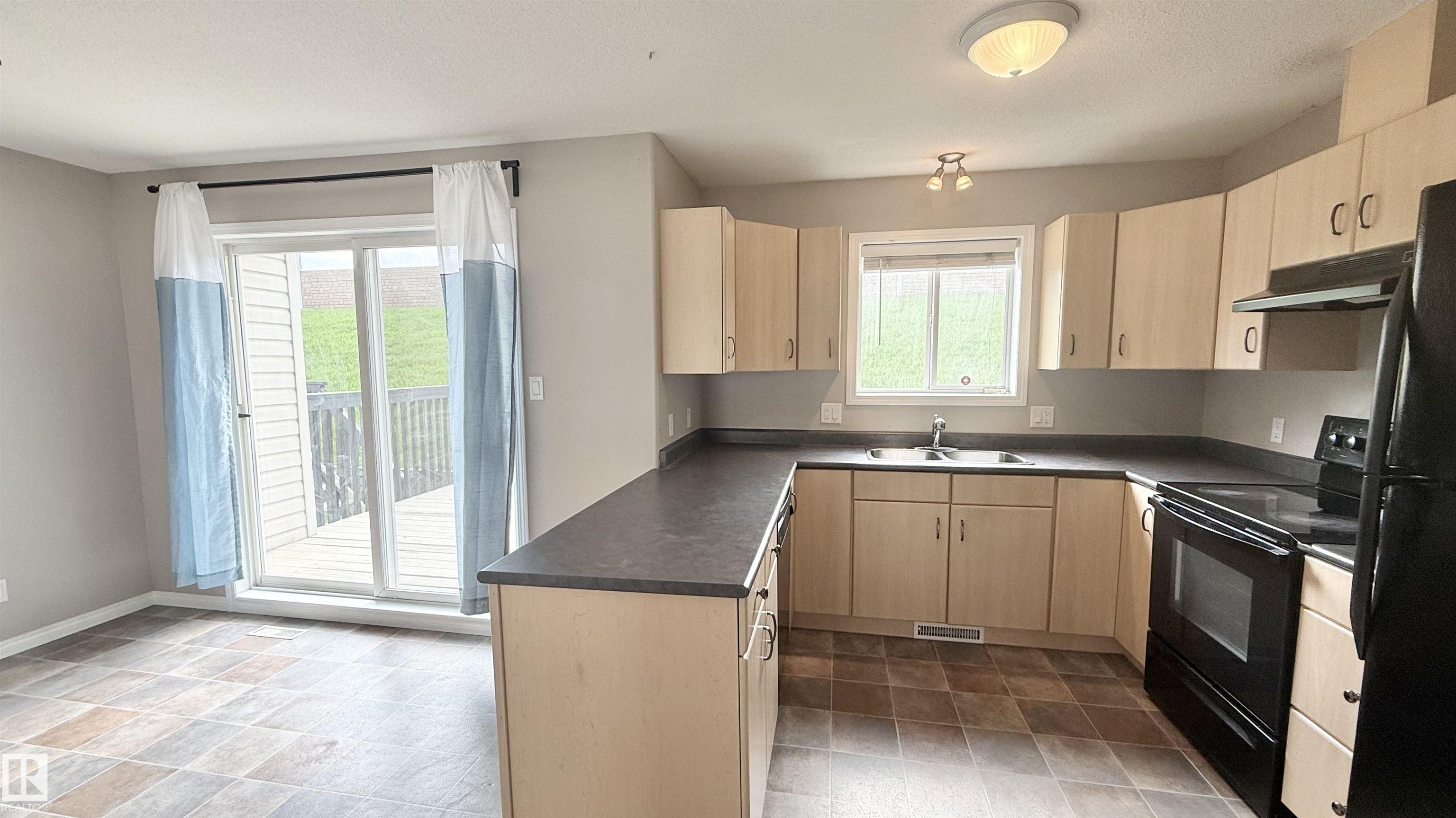 Photo 10 at 9 - 225 Blackburn Drive E SW, Blackburne, Edmonton