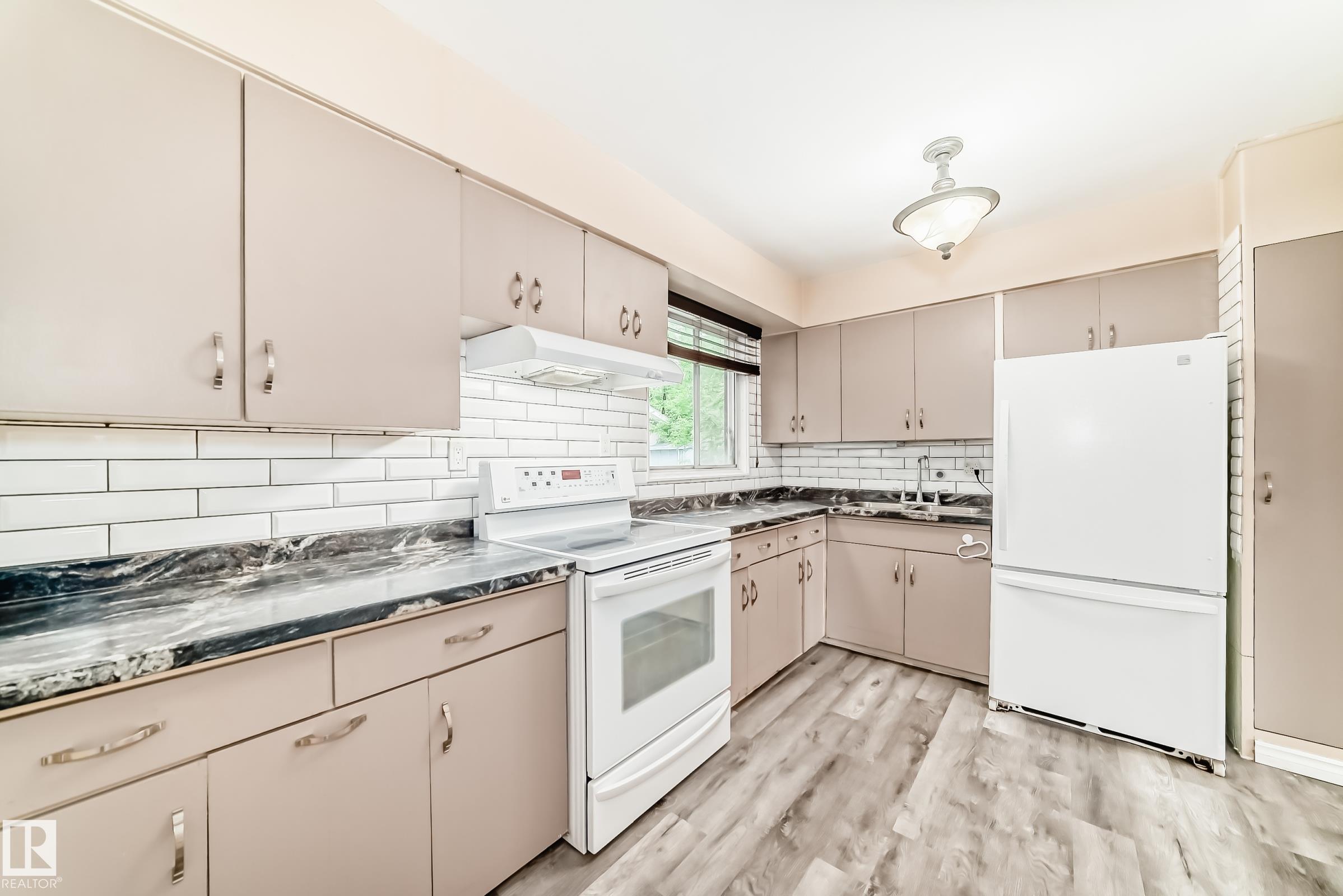 Photo 10 at 13215 132 Avenue NW, Athlone, Edmonton