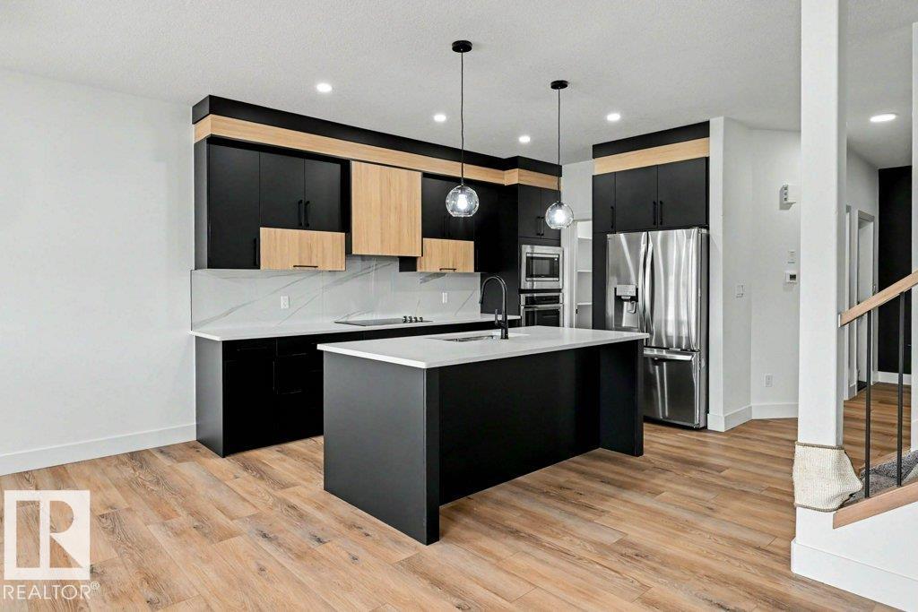 Photo 8 at 103 Miller Wynd, Meadowview Park, Leduc