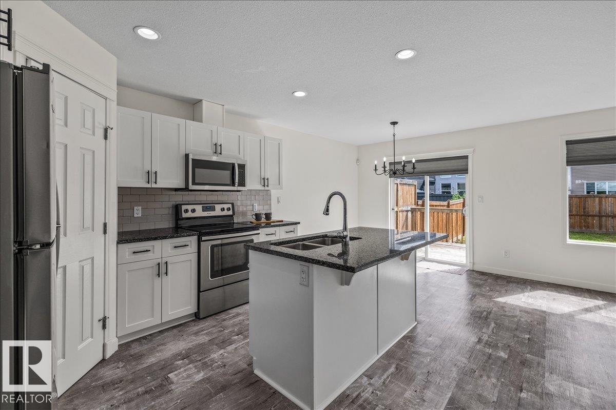 Photo 11 at 17703 65 Street NW, McConachie Area, Edmonton