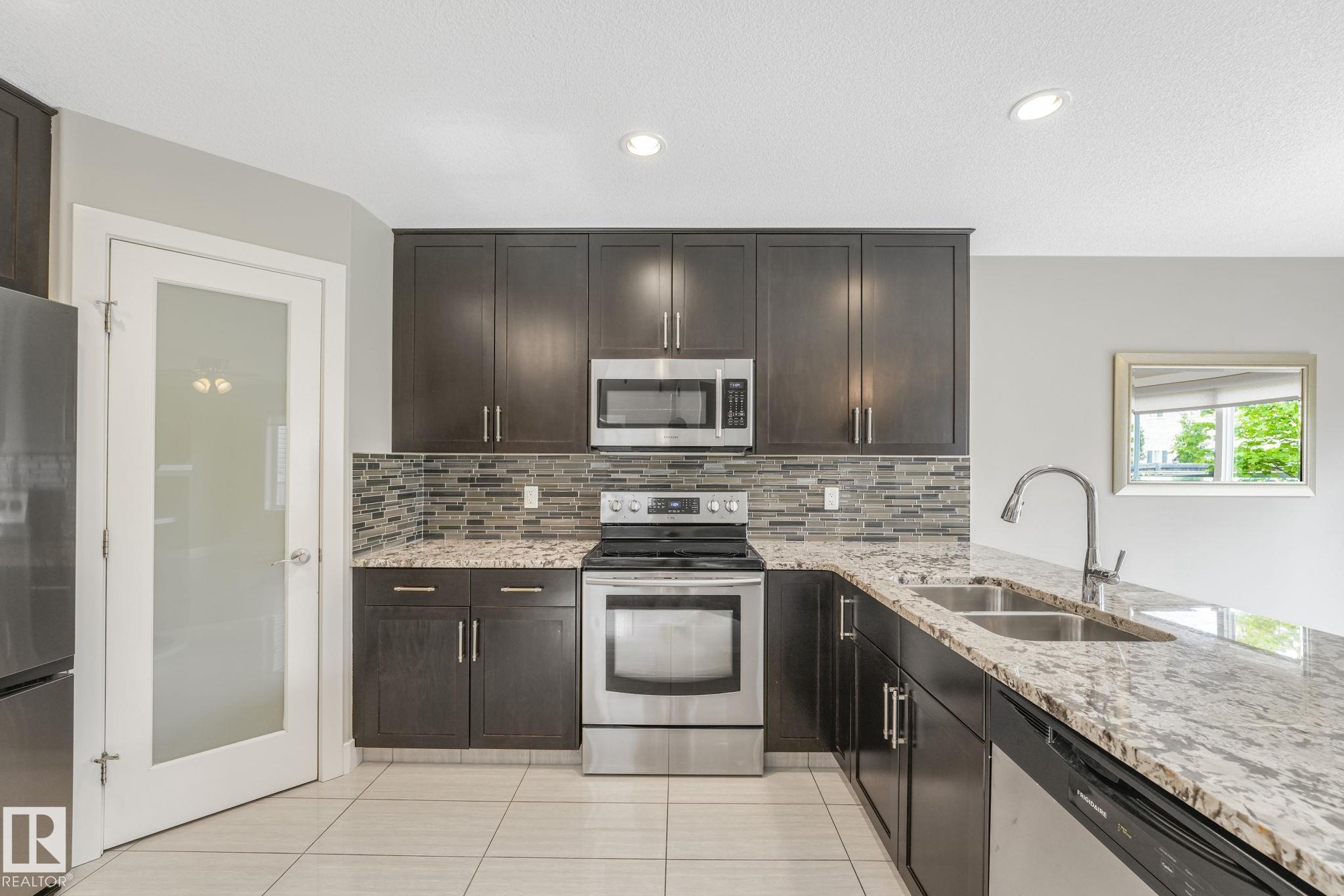 Photo 6 at 5970 167c Avenue NW, McConachie Area, Edmonton