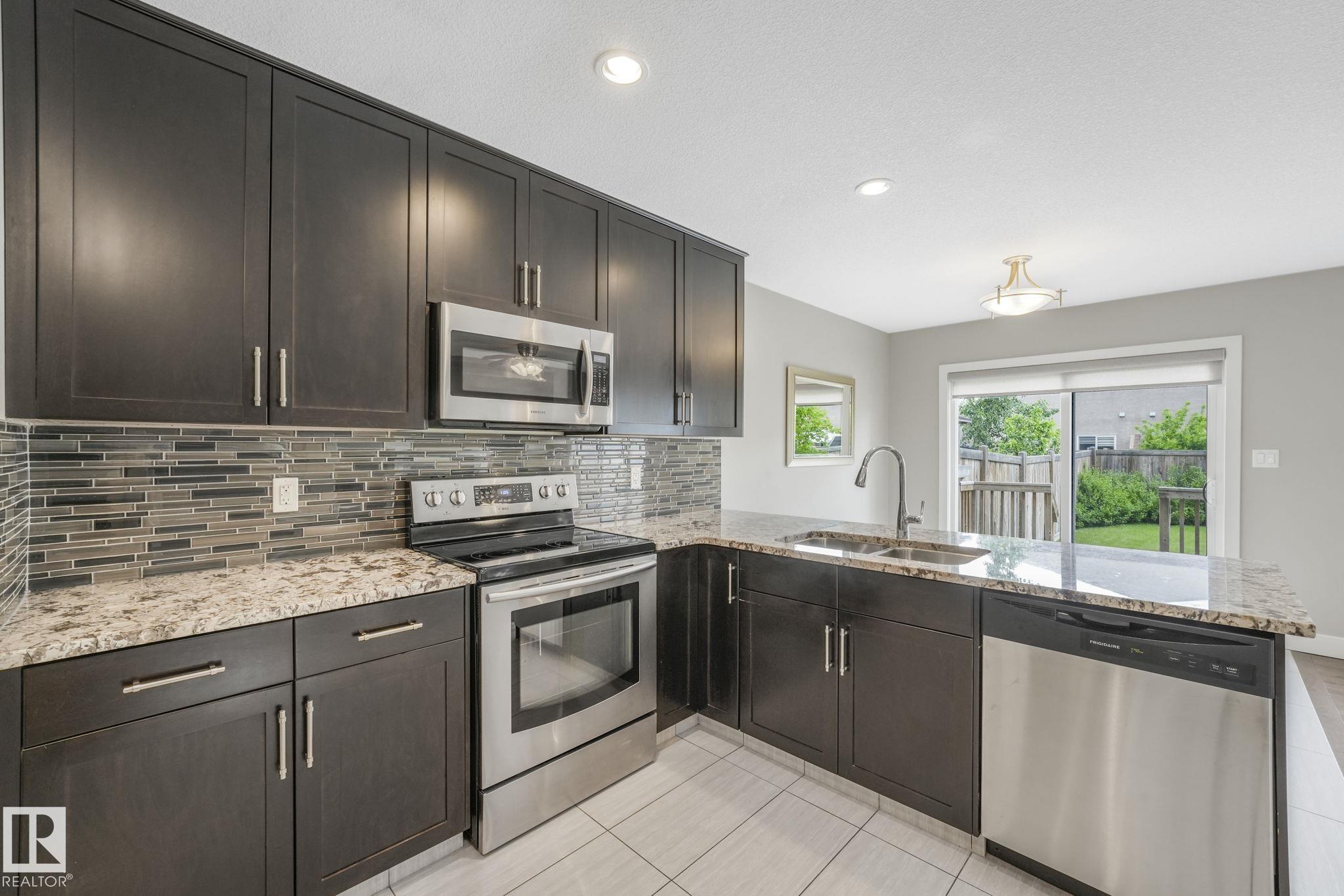 Photo 7 at 5970 167c Avenue NW, McConachie Area, Edmonton