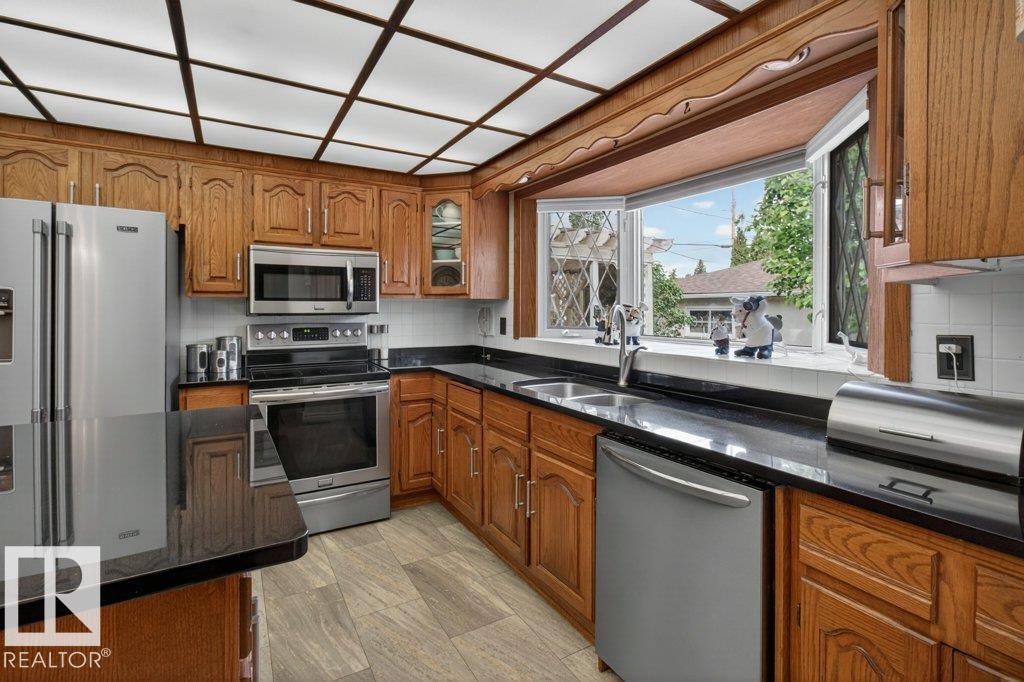 Photo 10 at 6616 95 Avenue NW, Ottewell, Edmonton