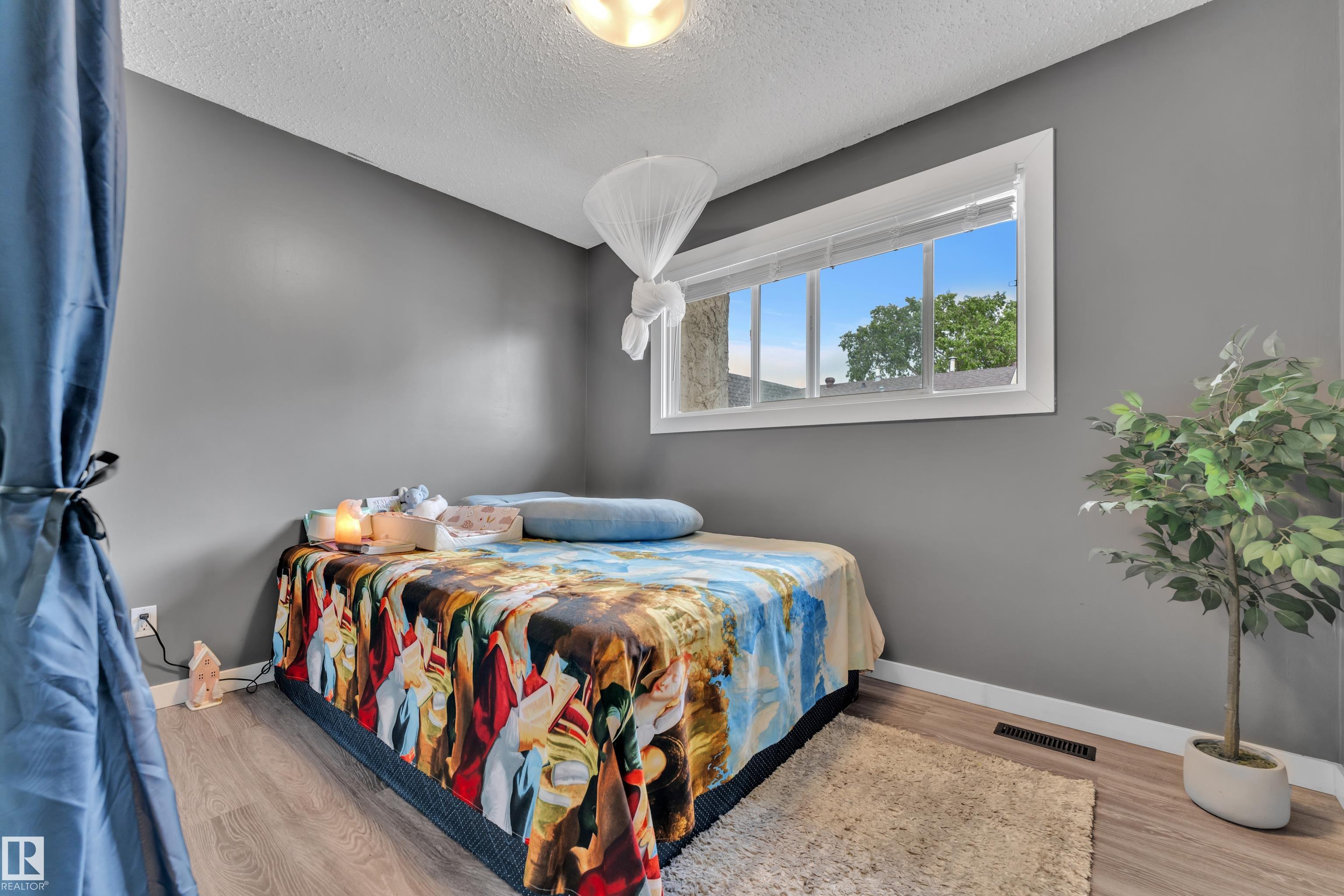 Photo 18 at 3217 132a Avenue NW, Belmont, Edmonton