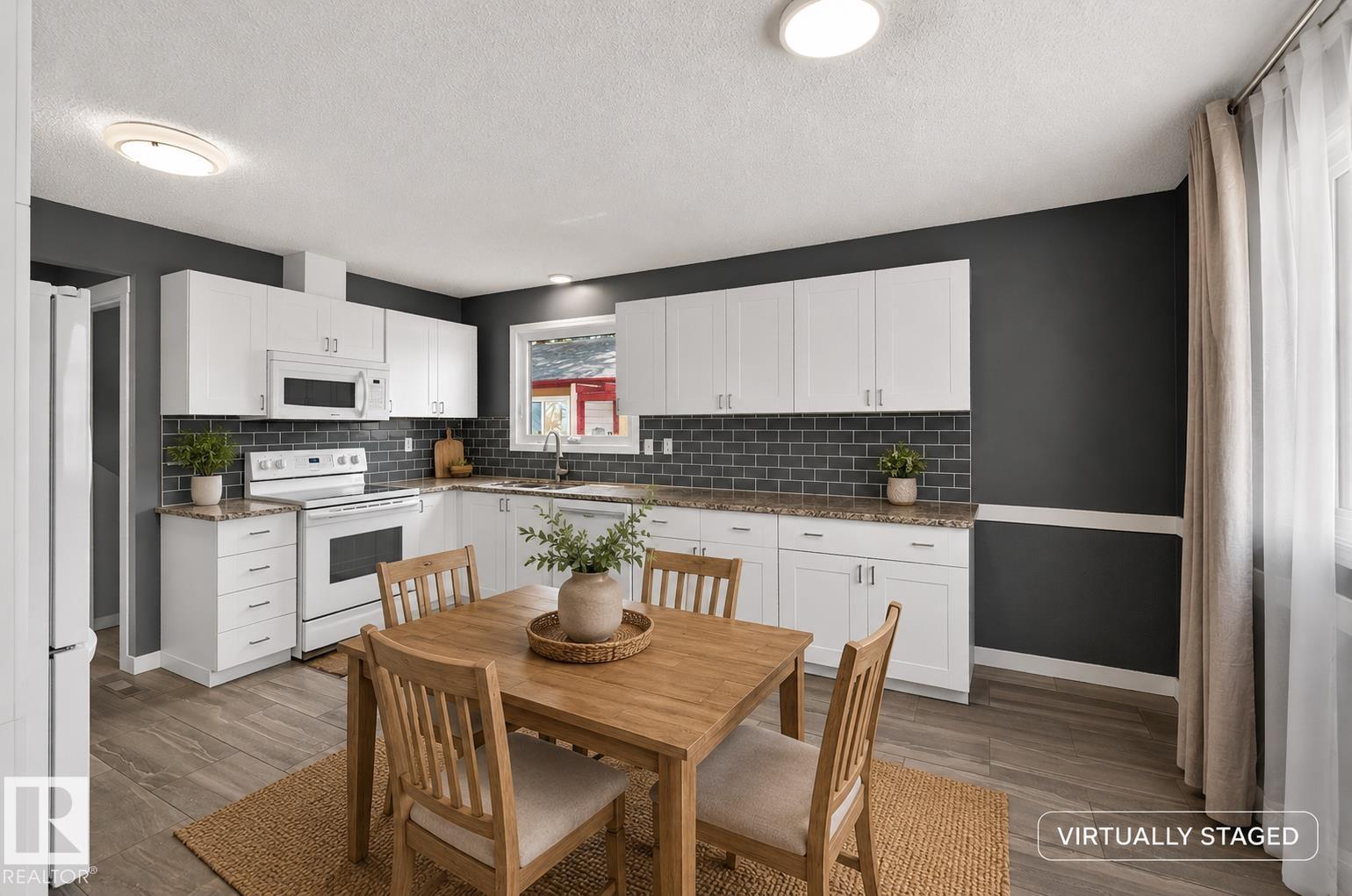 Photo 12 at 15115 22 Street NW, Fraser, Edmonton