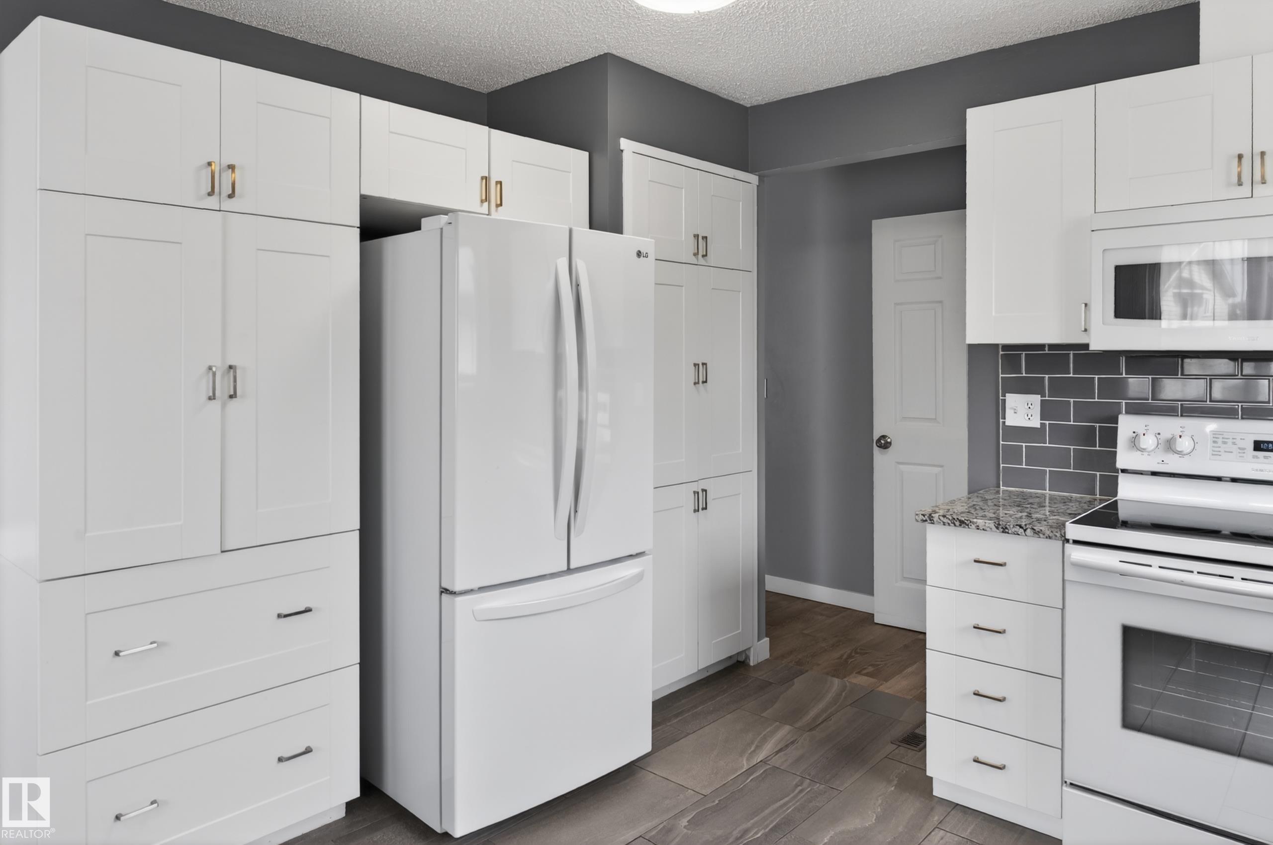 Photo 16 at 15115 22 Street NW, Fraser, Edmonton