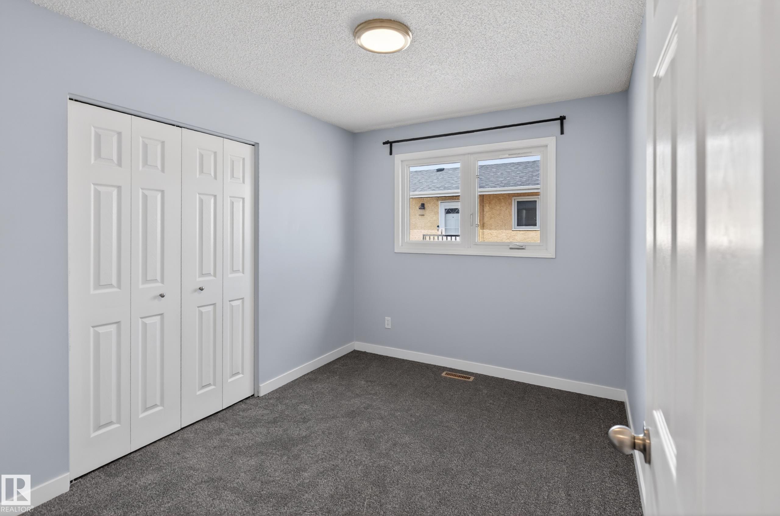 Photo 28 at 15115 22 Street NW, Fraser, Edmonton