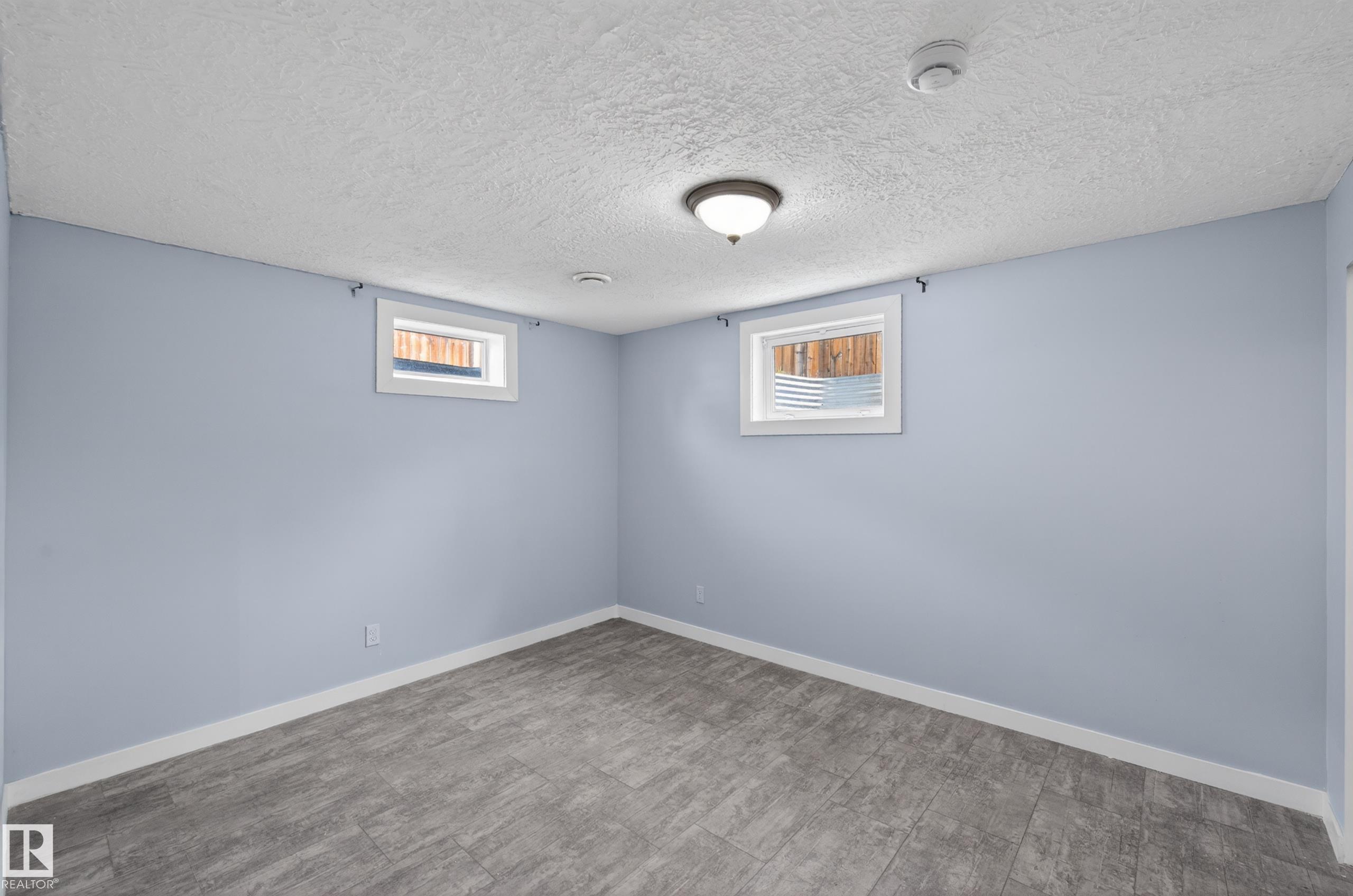 Photo 42 at 15115 22 Street NW, Fraser, Edmonton