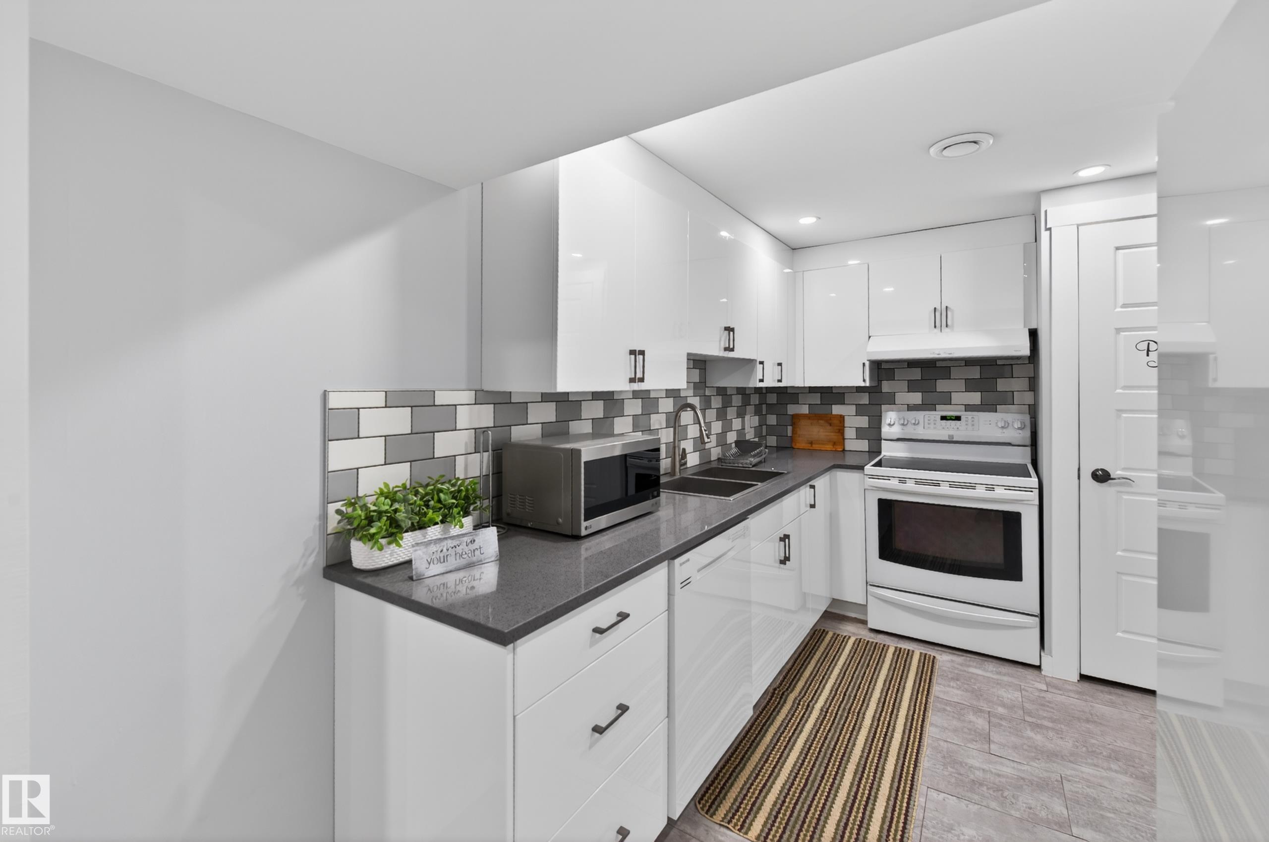 Photo 46 at 15115 22 Street NW, Fraser, Edmonton