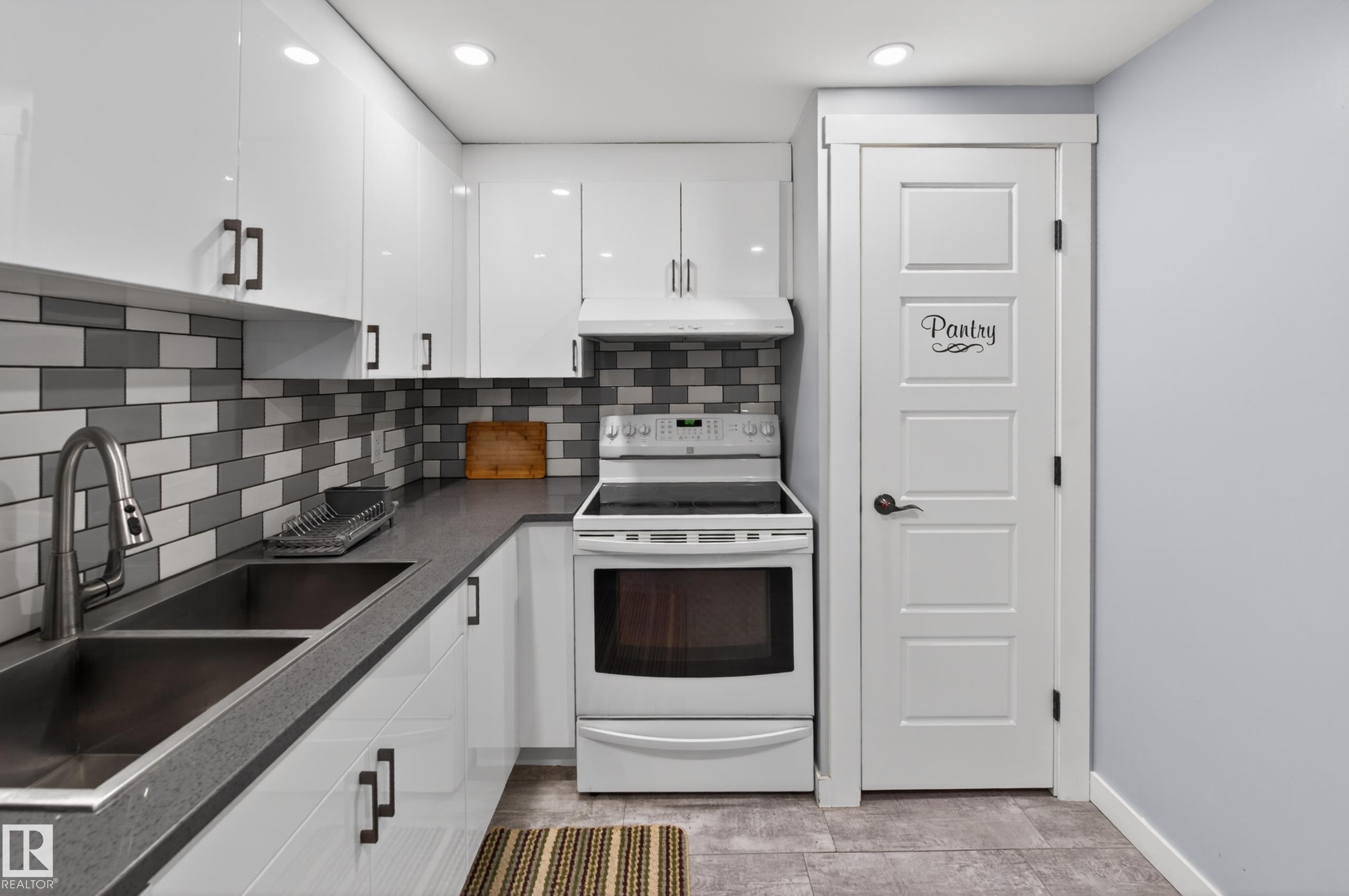 Photo 47 at 15115 22 Street NW, Fraser, Edmonton