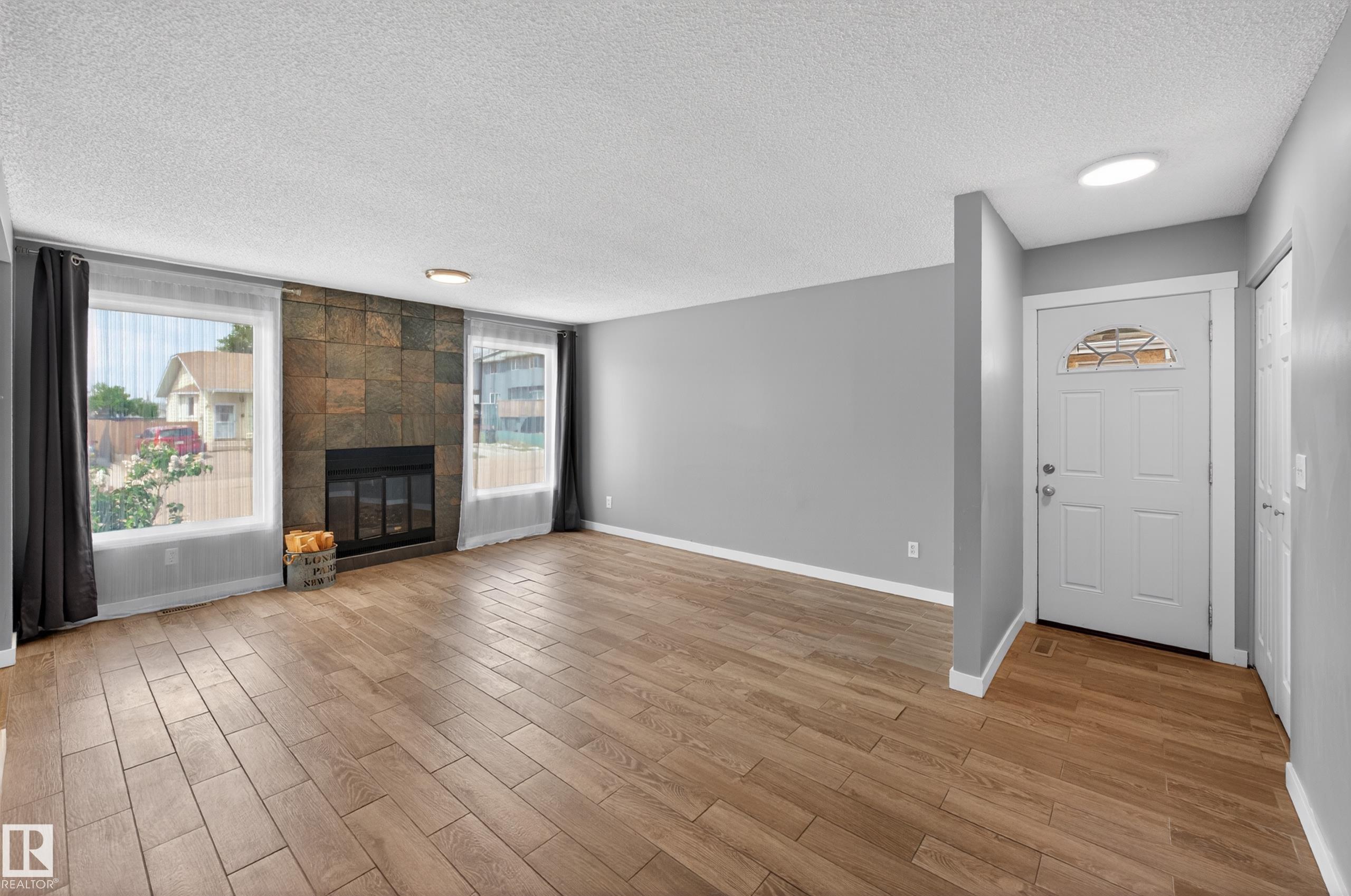 Photo 8 at 15115 22 Street NW, Fraser, Edmonton