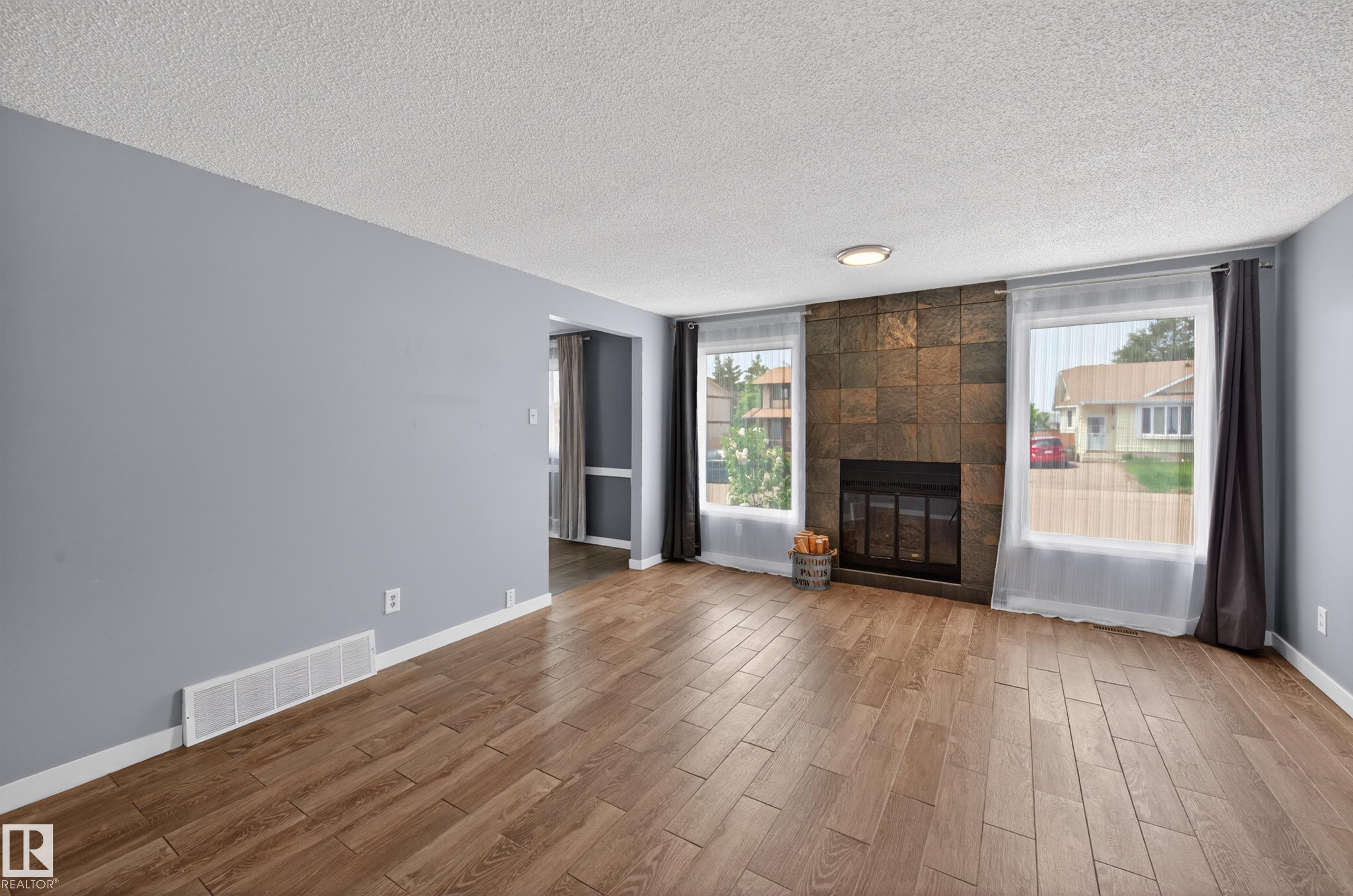 Photo 10 at 15115 22 Street NW, Fraser, Edmonton