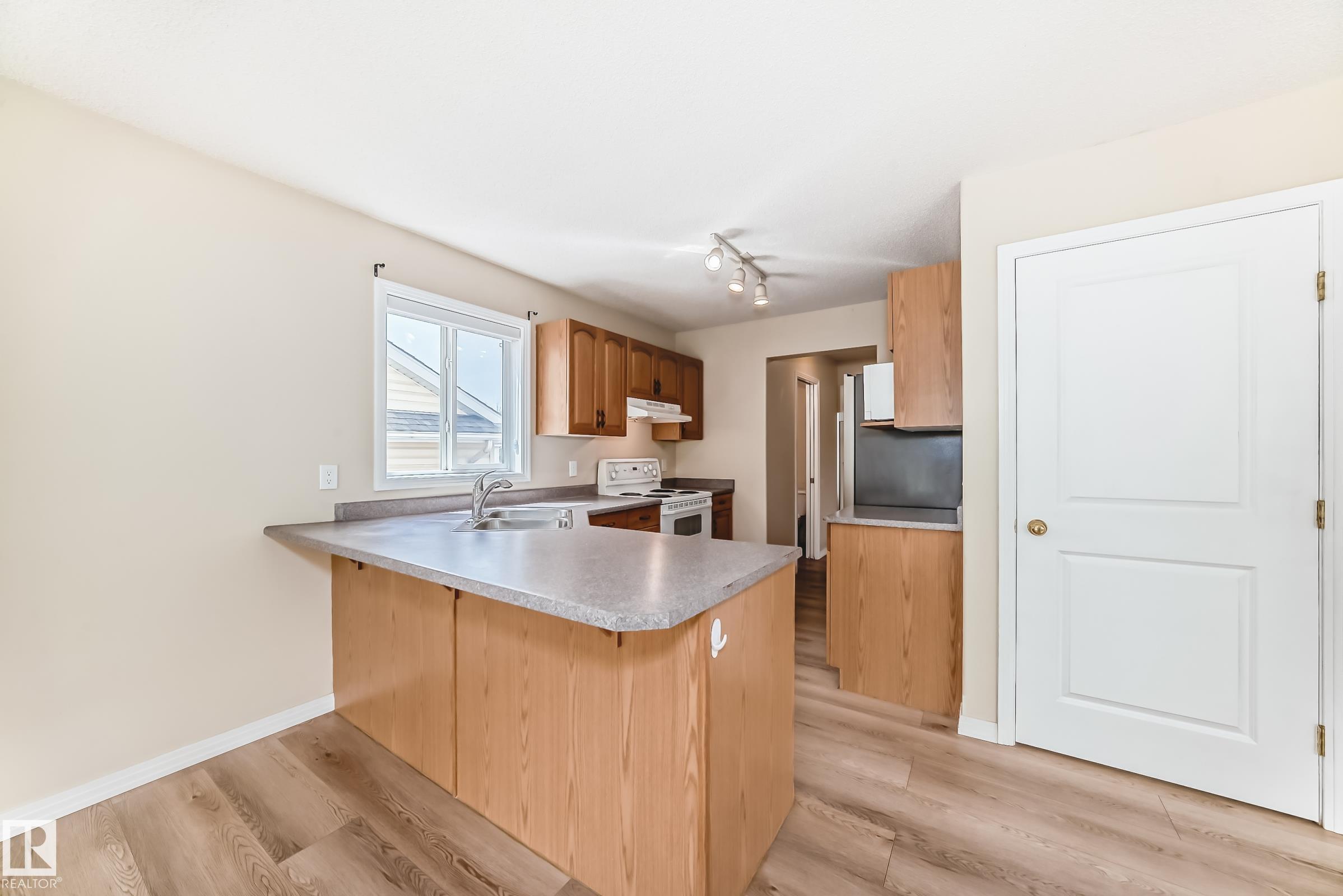 Photo 6 at 3711 22a Street NW, Wild Rose, Edmonton