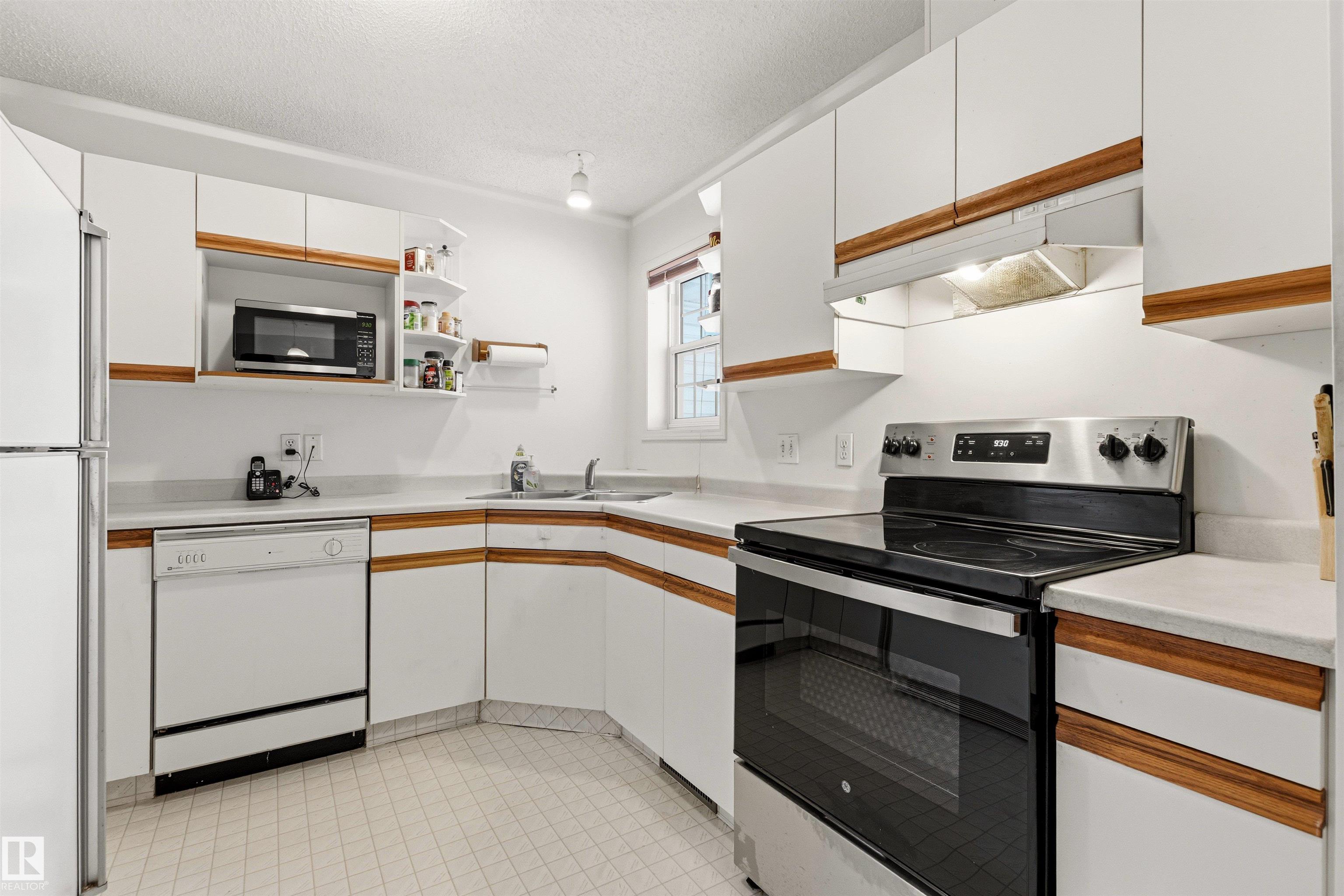 Photo 15 at 12 - 3311 58 Street NW, Tawa, Edmonton