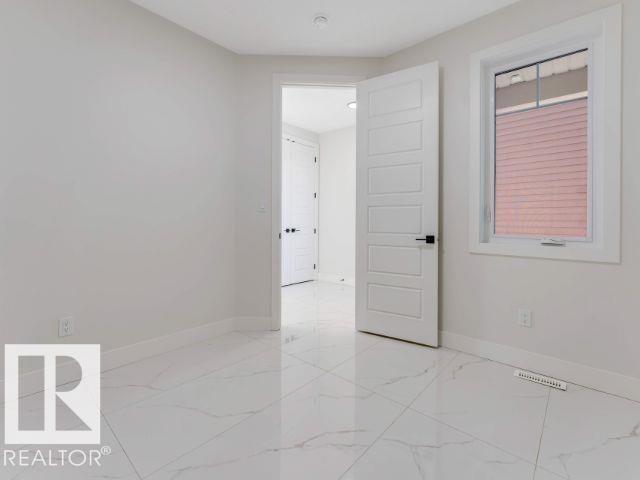 Photo 6 at 7156 177 Avenue NW, Crystallina Nera East, Edmonton