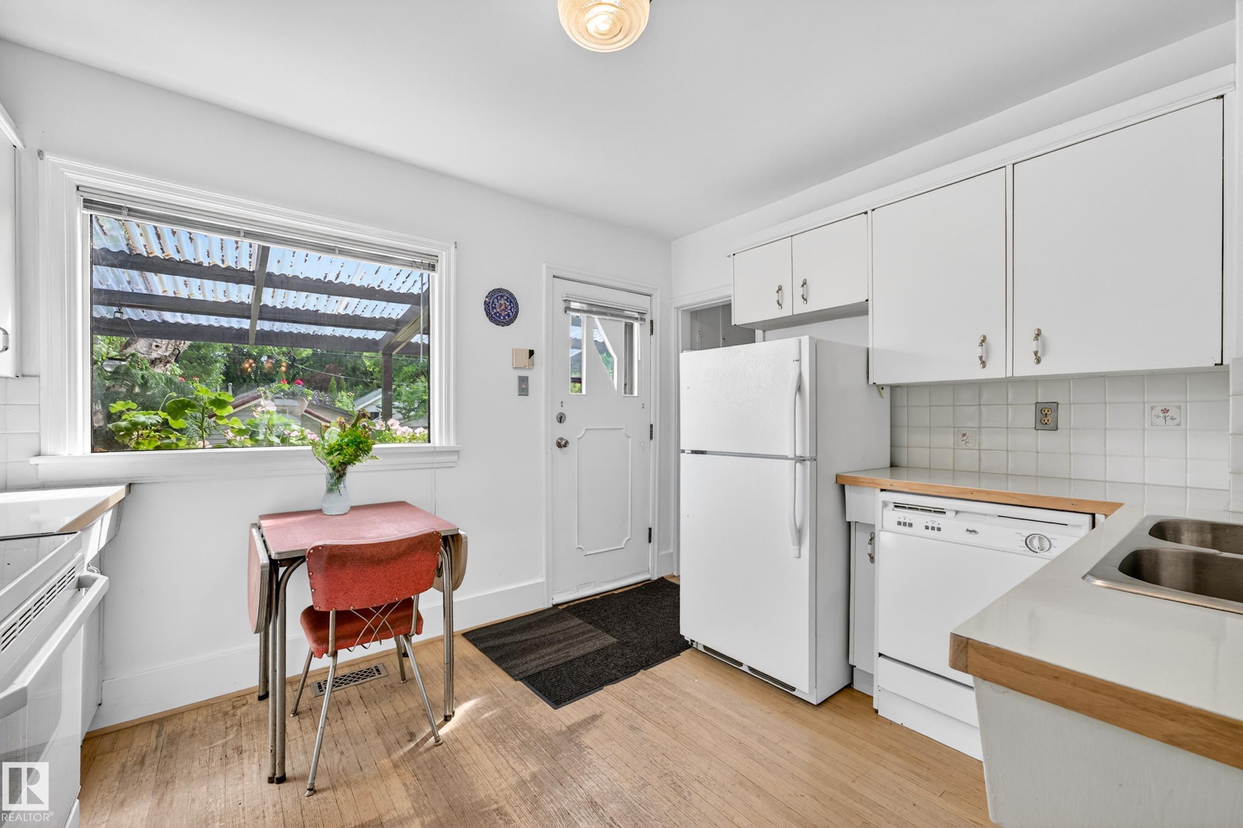Photo 17 at 11313 67 Street NW, Highlands, Edmonton