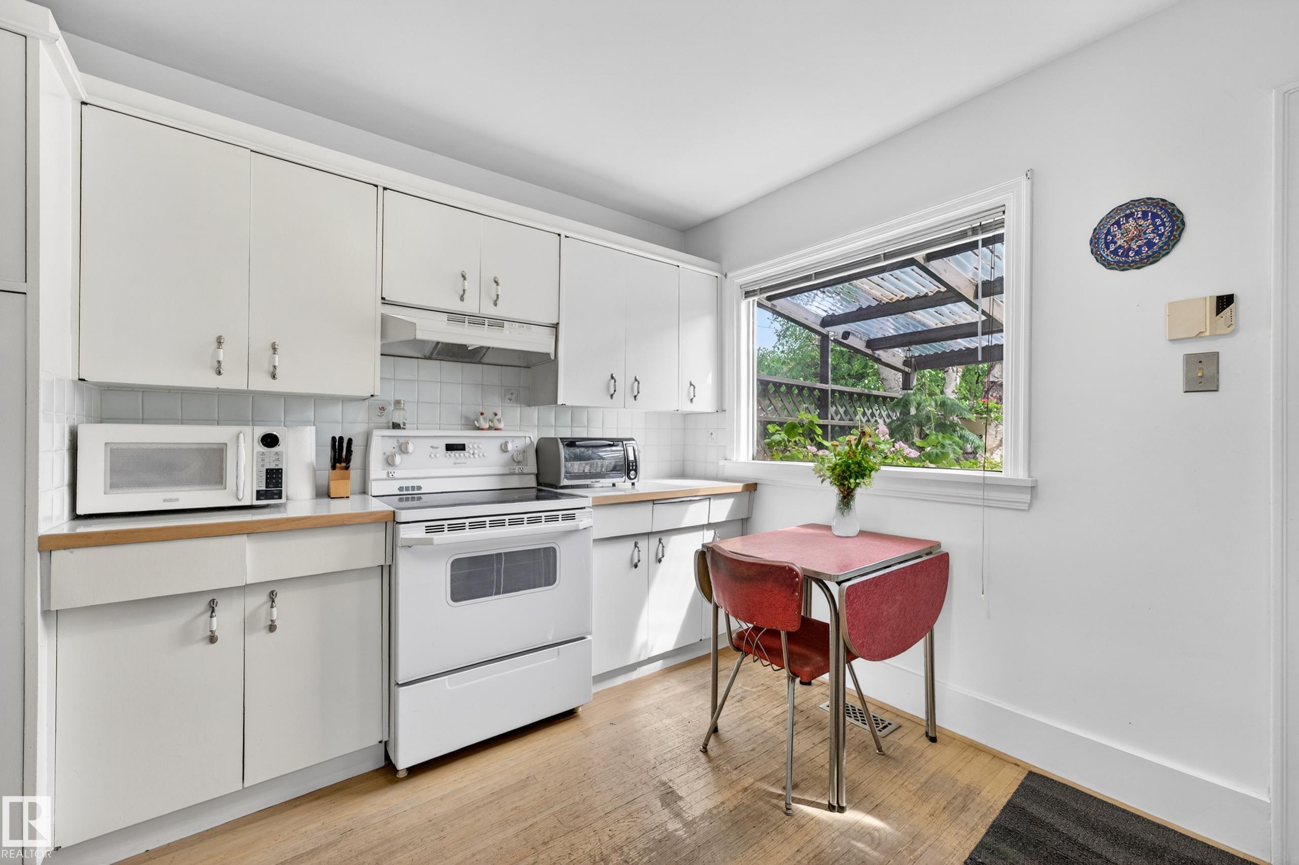 Photo 18 at 11313 67 Street NW, Highlands, Edmonton