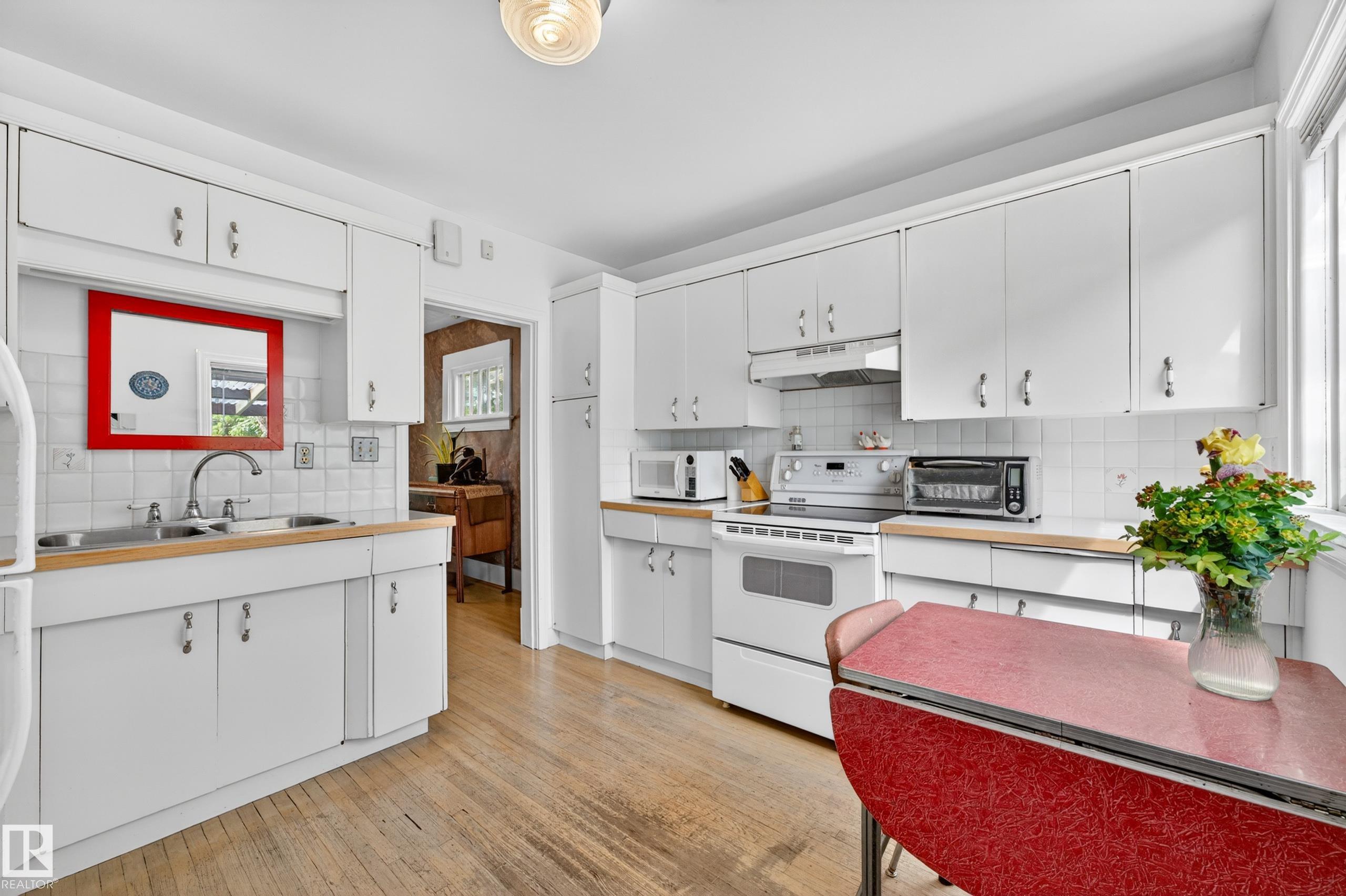 Photo 19 at 11313 67 Street NW, Highlands, Edmonton