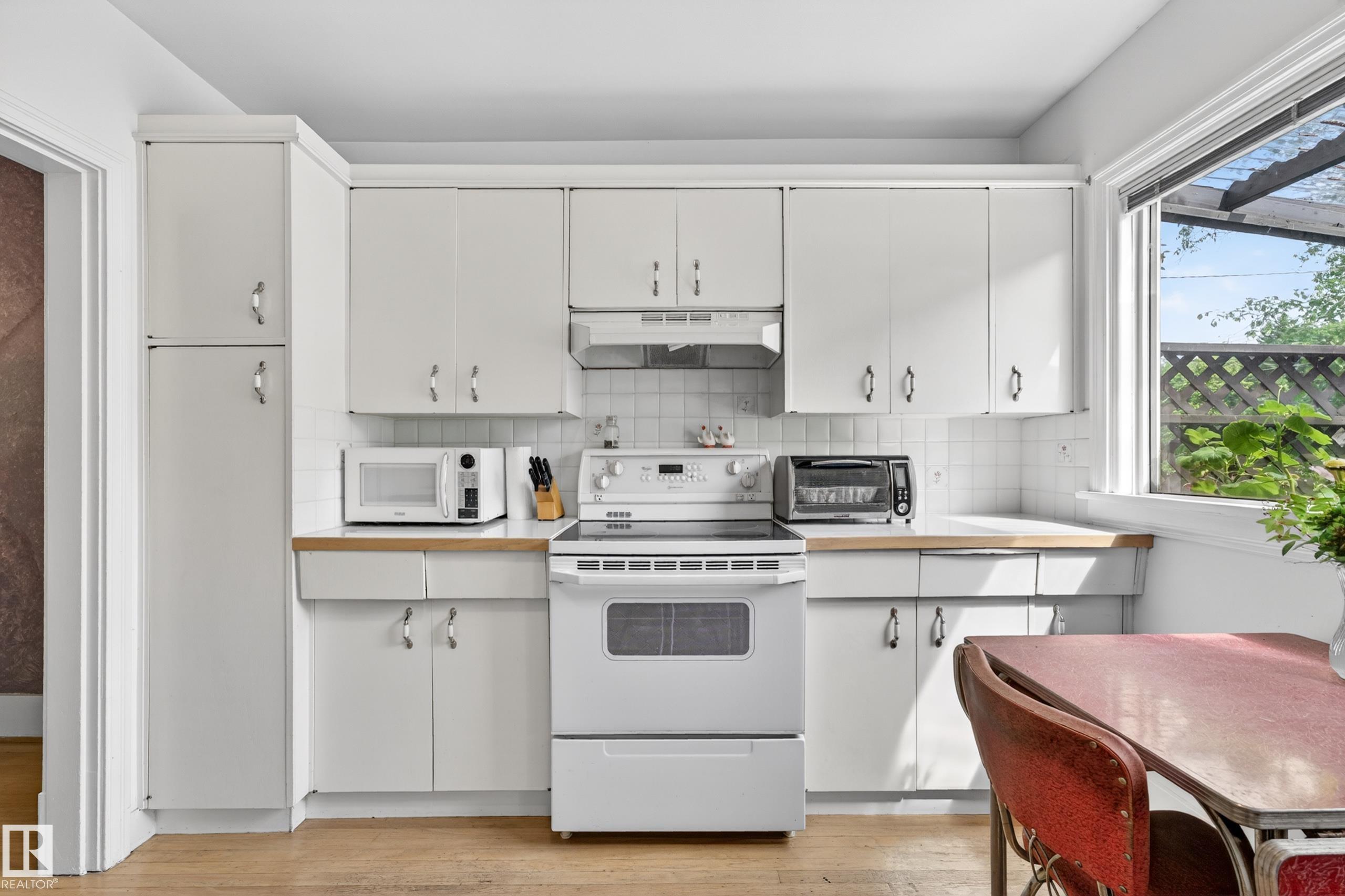 Photo 21 at 11313 67 Street NW, Highlands, Edmonton