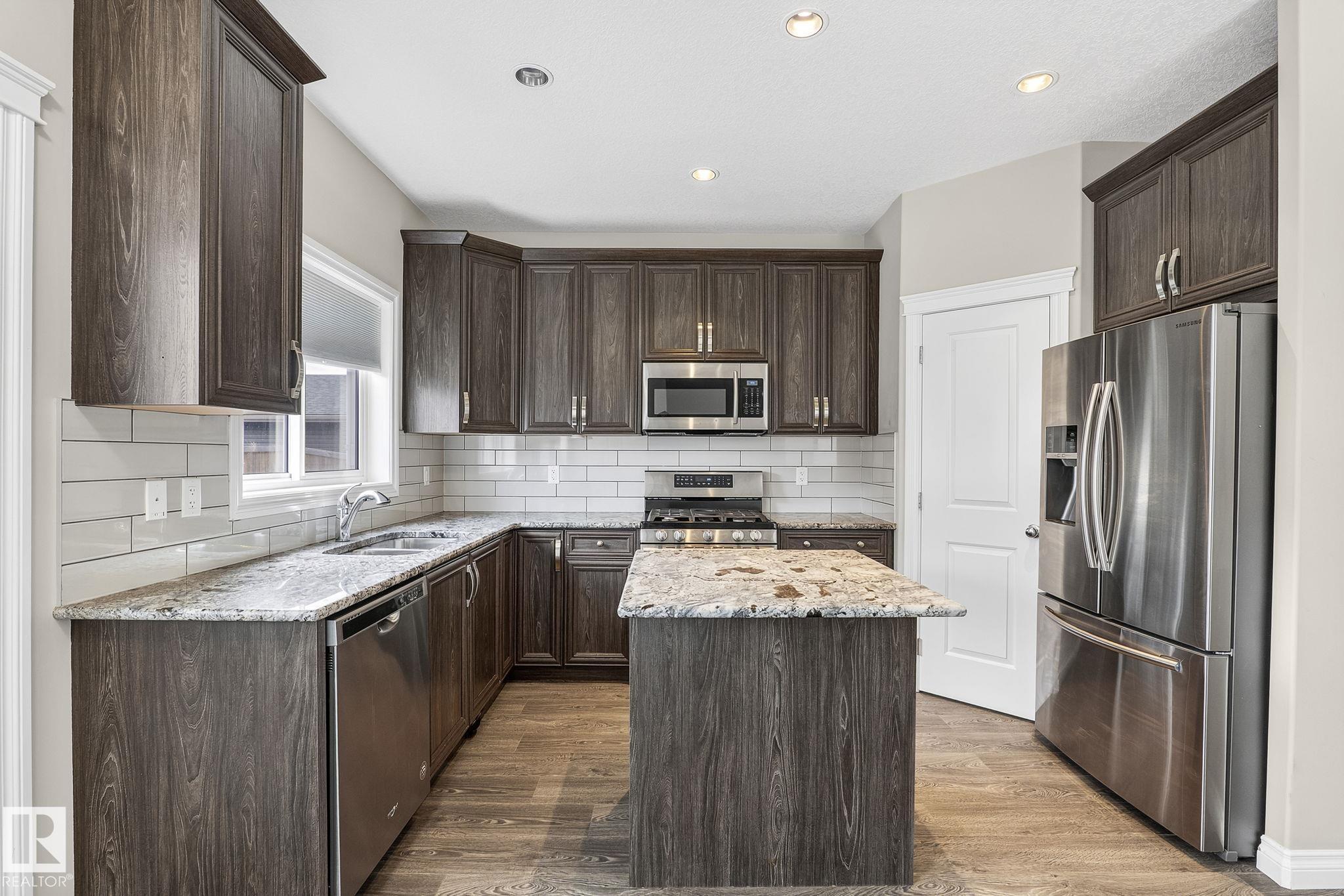 Photo 11 at 6927 Cardinal Wynd SW, Chappelle Area, Edmonton