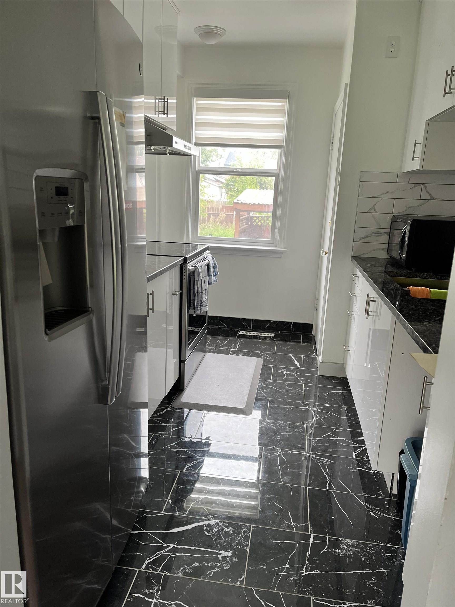 Photo 9 at 11314 78 Avenue NW, McKernan, Edmonton